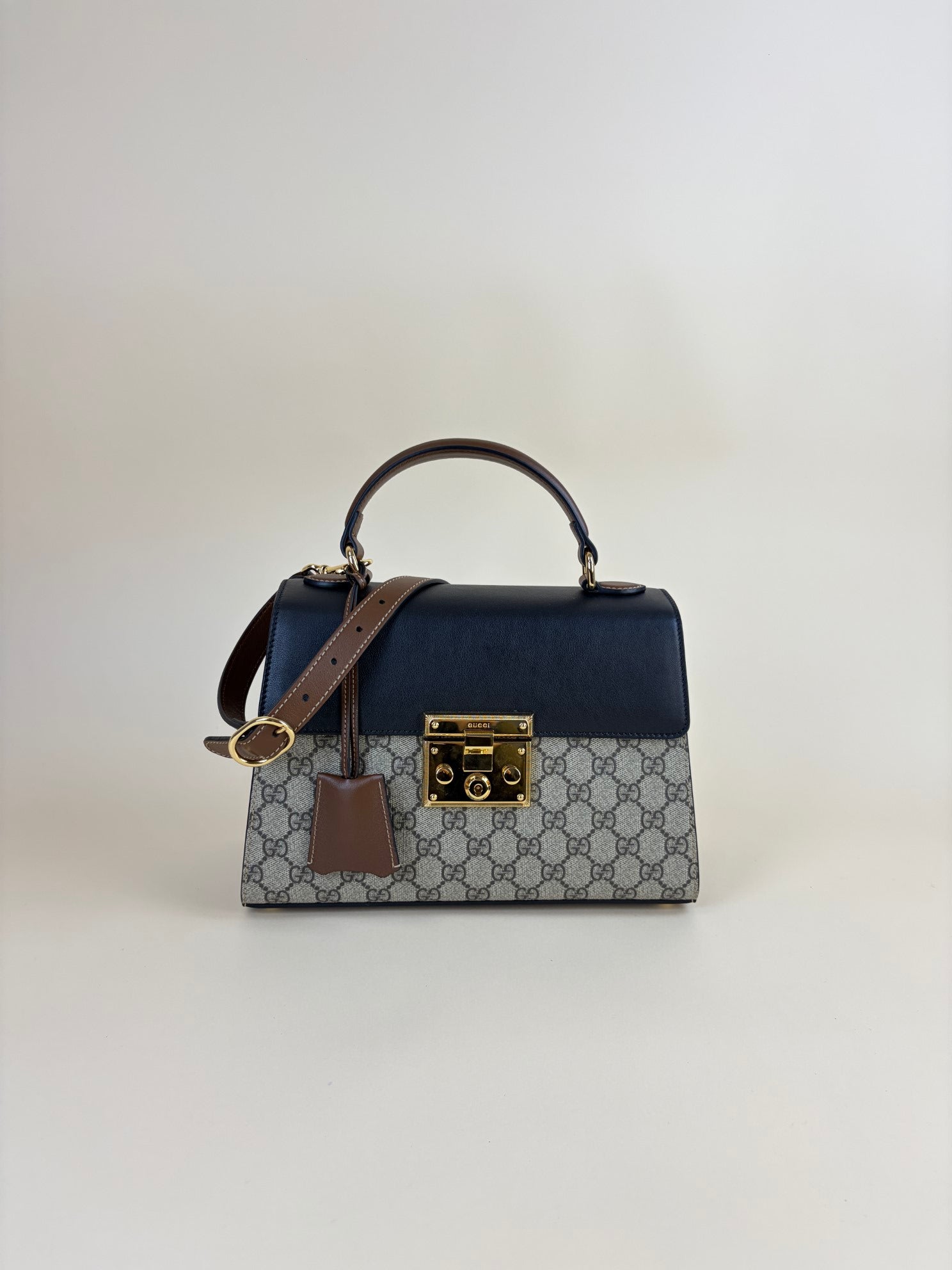 Gucci gg supreme coated small canvas monogram padlock