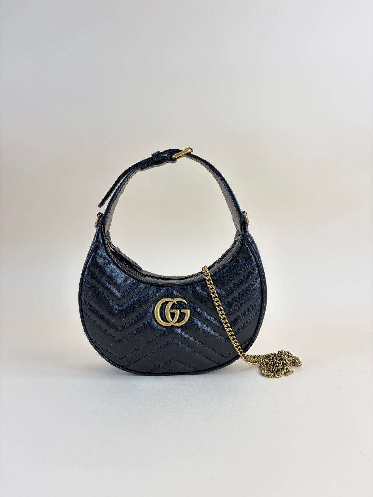 Gucci calfskin matelassé Black chevron small GG Marmont half-moon hob bag
