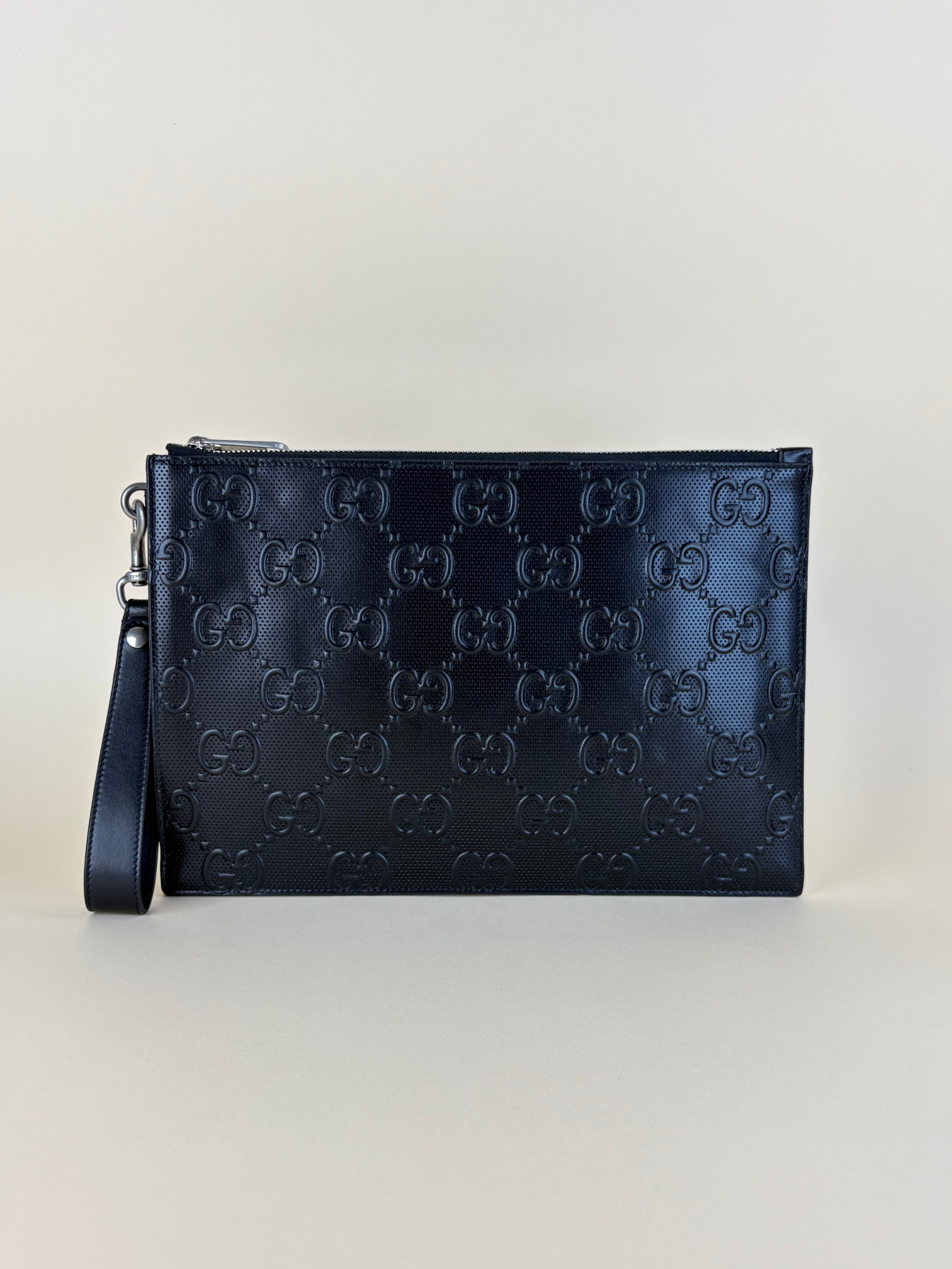 Gucci black calfskin gg tennis embossed wristlet pouch