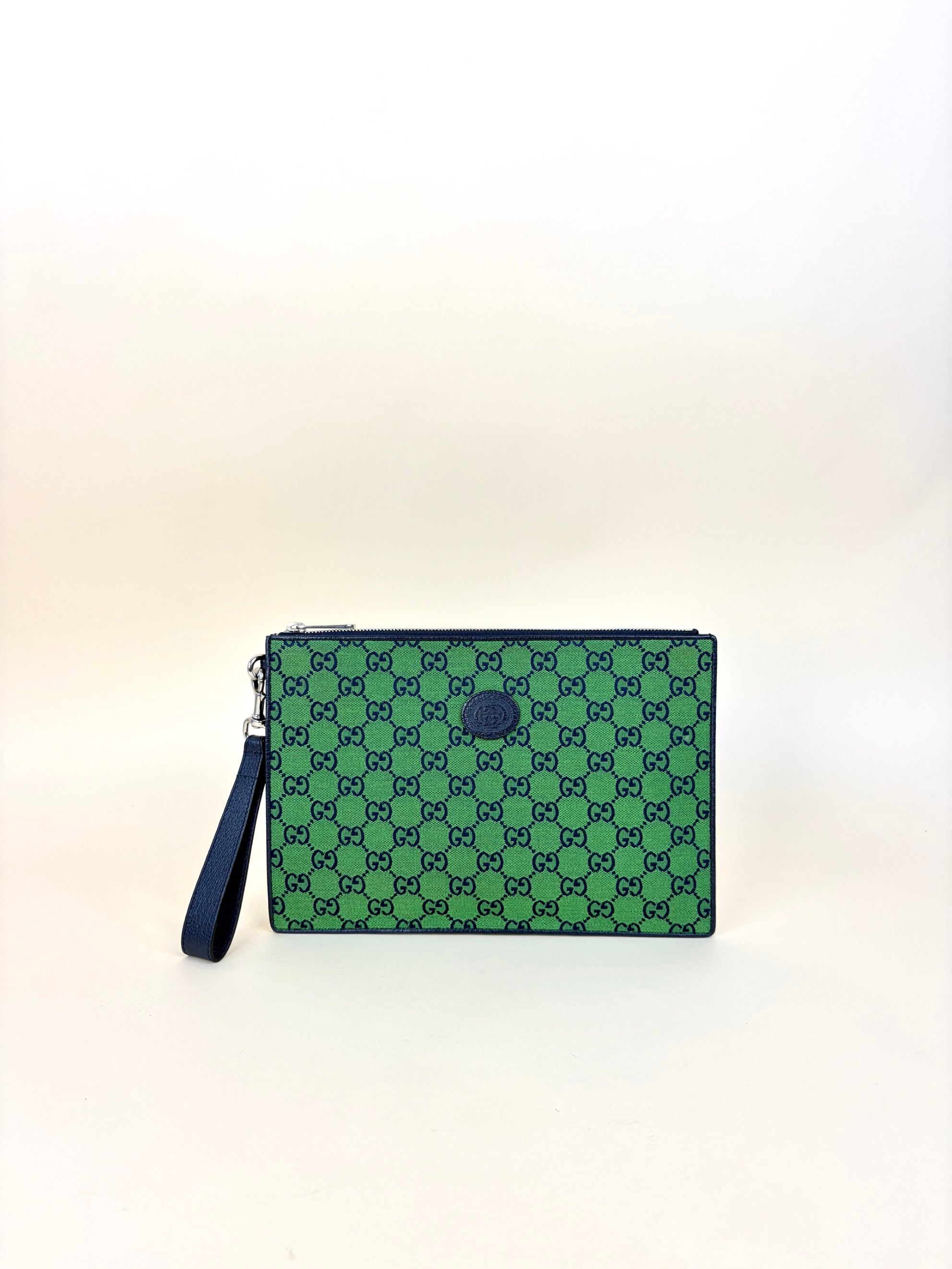 Gucci blue gg monogram multi color retro interlocking g wristlet pouch