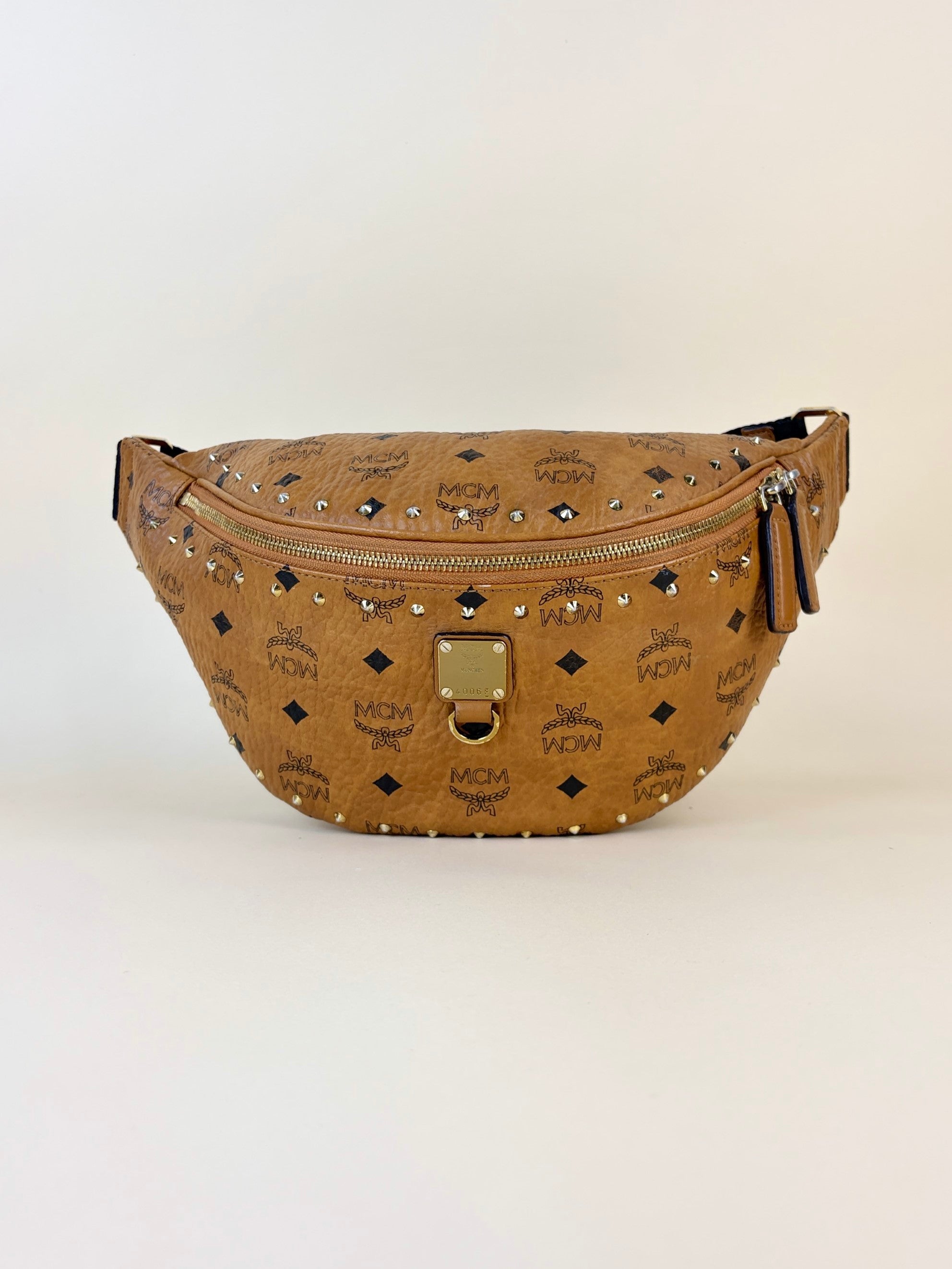 MCM cognac fursten visitors studded outhine Camel larag belt bag