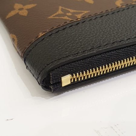 Louis Vuitton Monogram Black Daily Pouch-Pouch-Louis Vuitton-The Closet Egypt