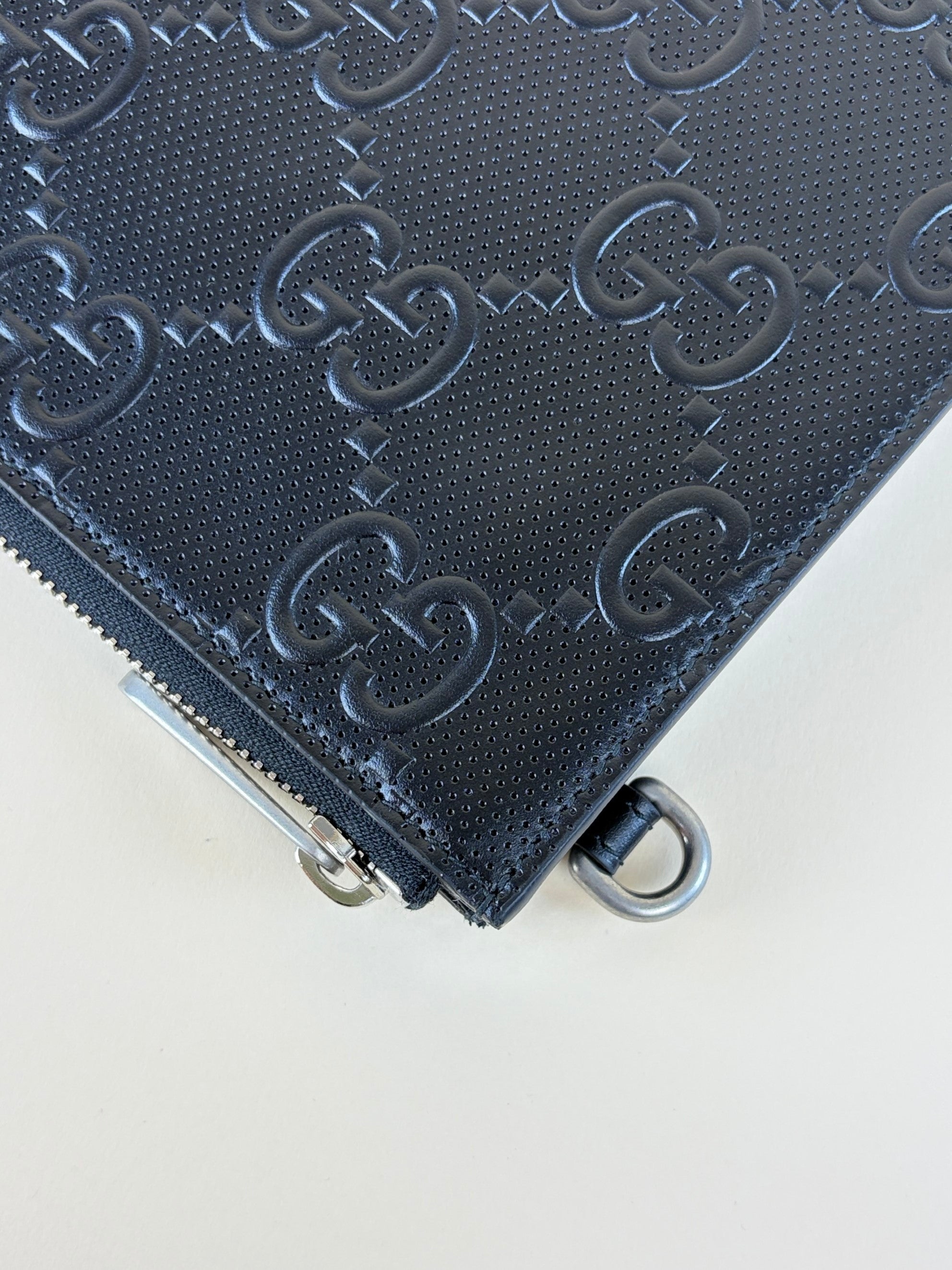 Gucci Black GG Tennis Embossed Wristlet Pouch