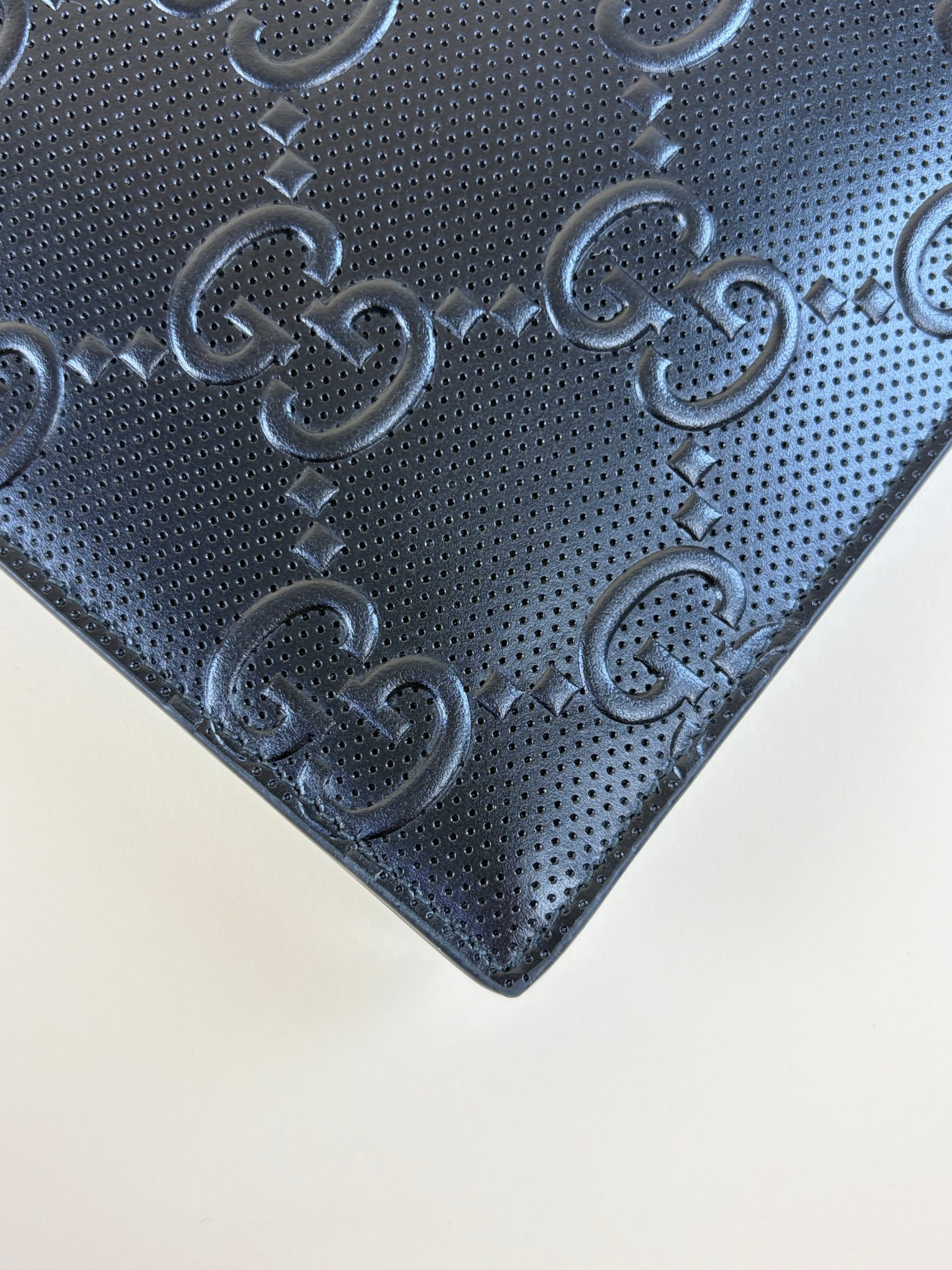Gucci Black GG Tennis Embossed Wristlet Pouch