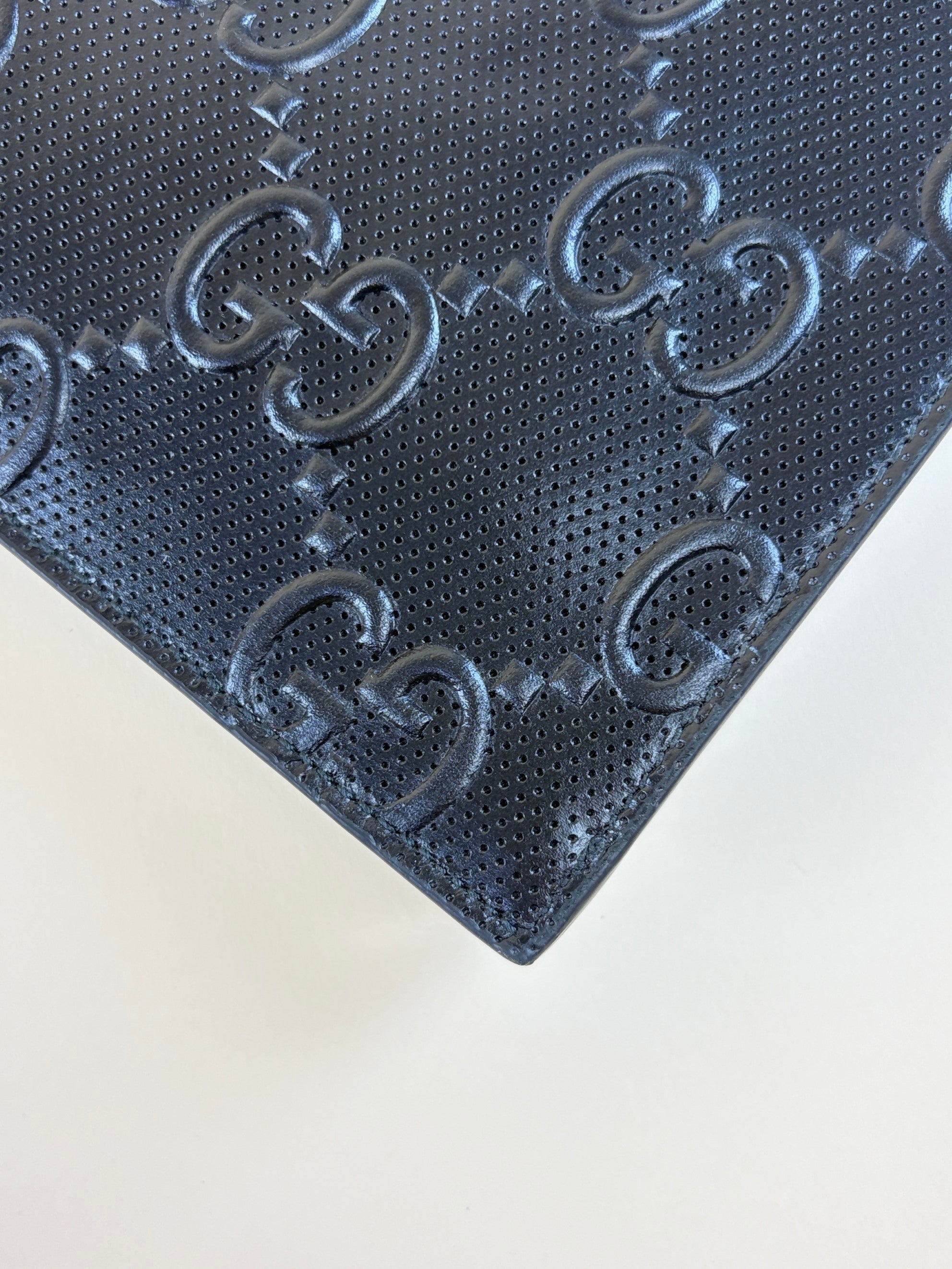 Gucci Black GG Tennis Embossed Wristlet Pouch