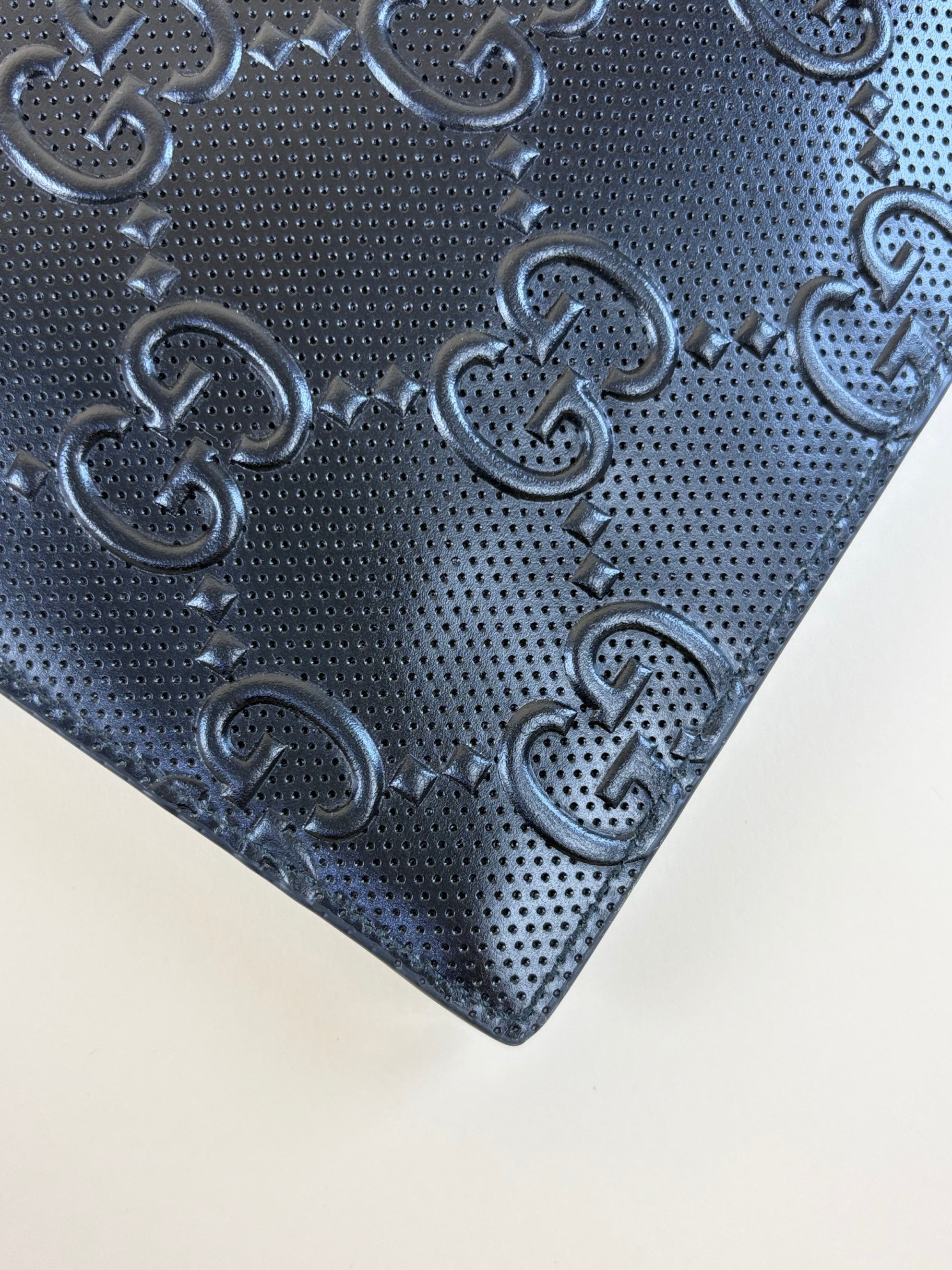 Gucci Black GG Tennis Embossed Wristlet Pouch