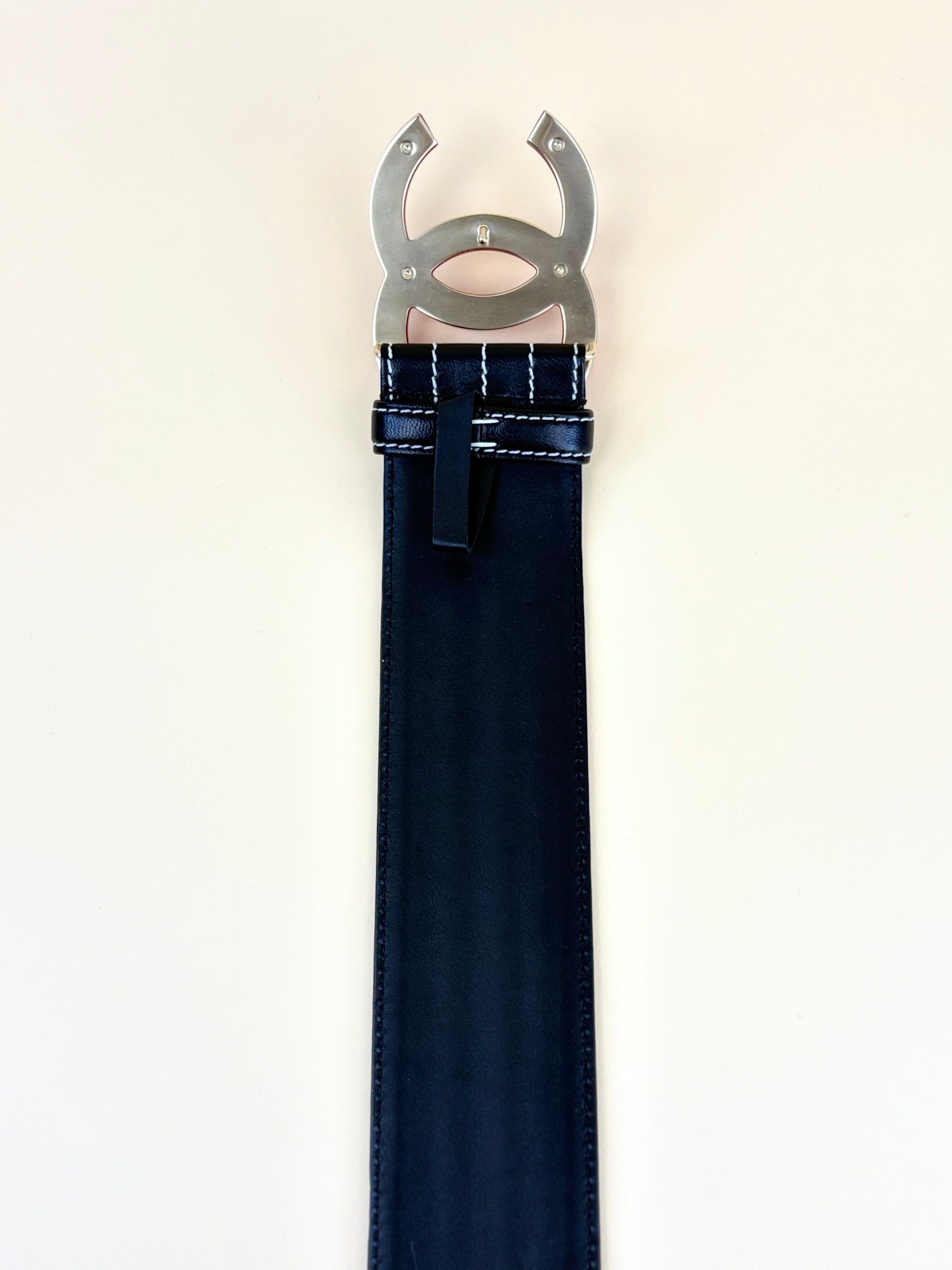CHANEL black leather belt stitched red cc resin buckle logo