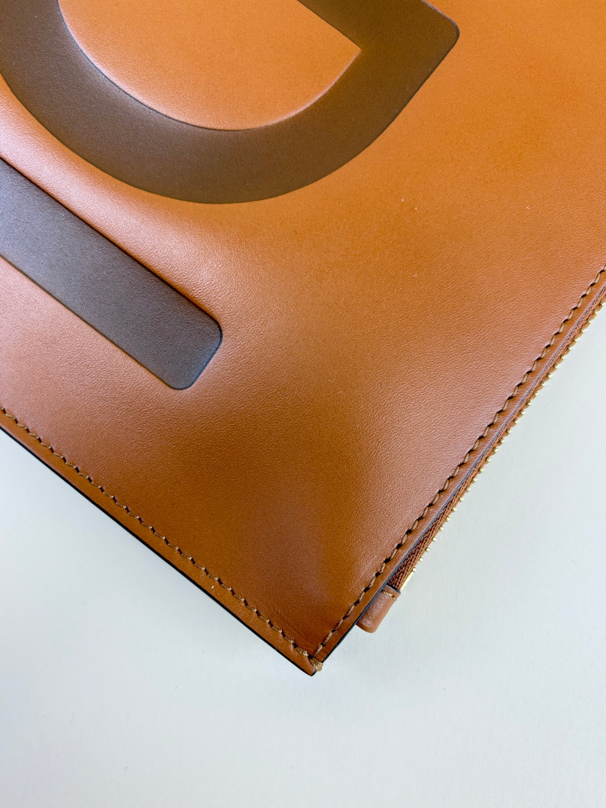 Fendi camel vitello kink Fendi roma logo embossed flat pouch