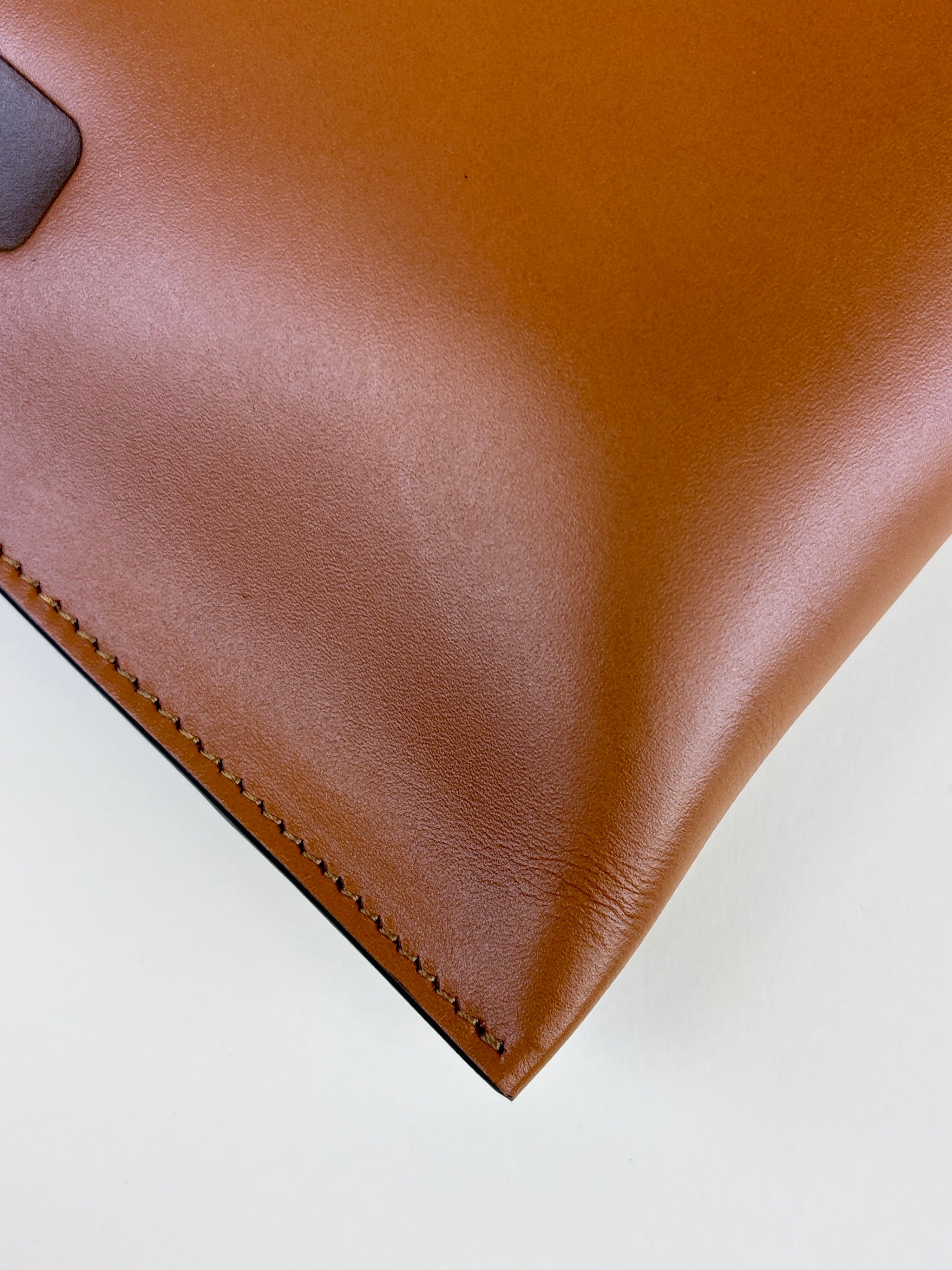 Fendi camel vitello kink Fendi roma logo embossed flat pouch