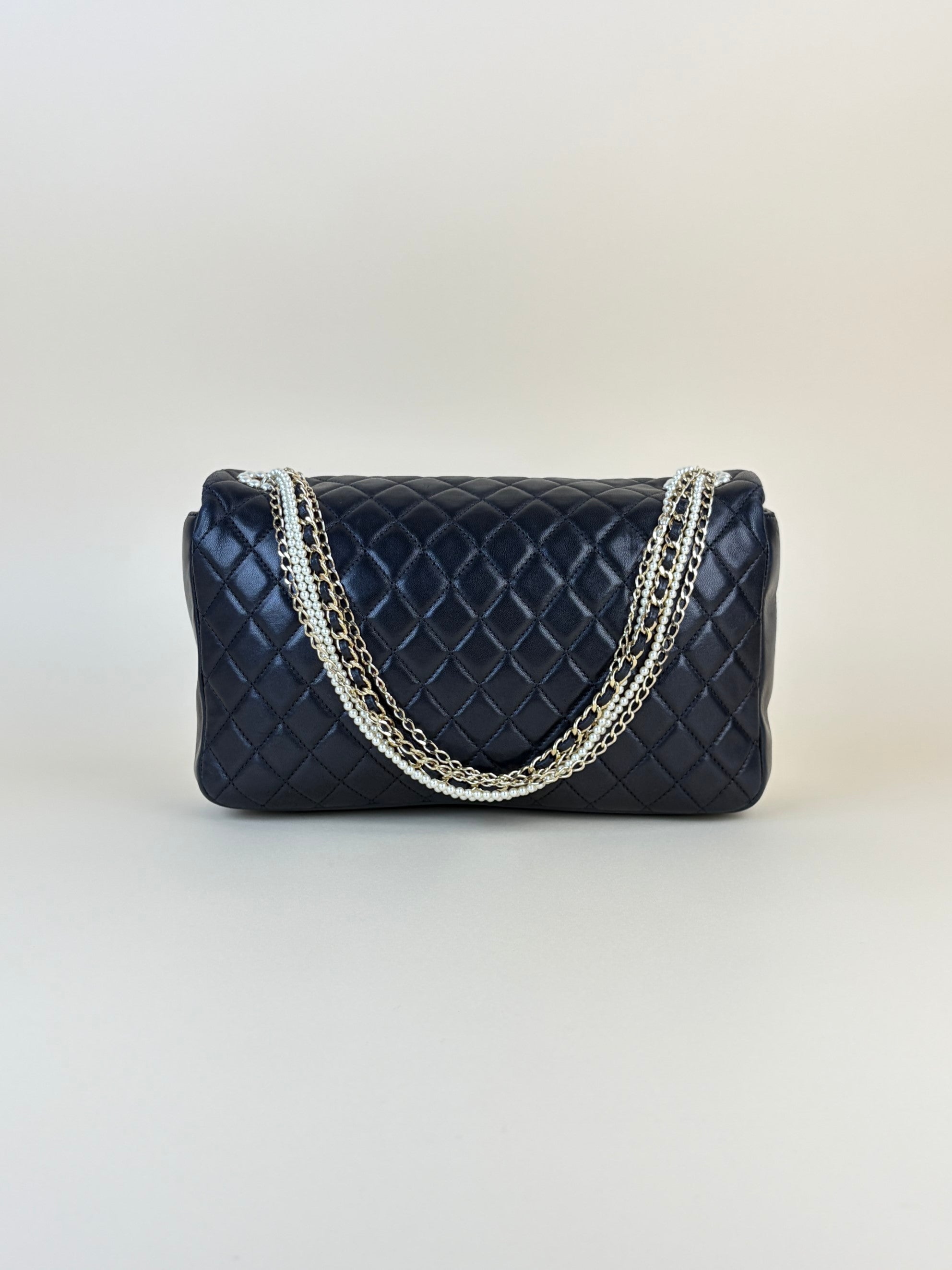 CHANEL black quilted lambskin leather Westminster pearl medium flap bag