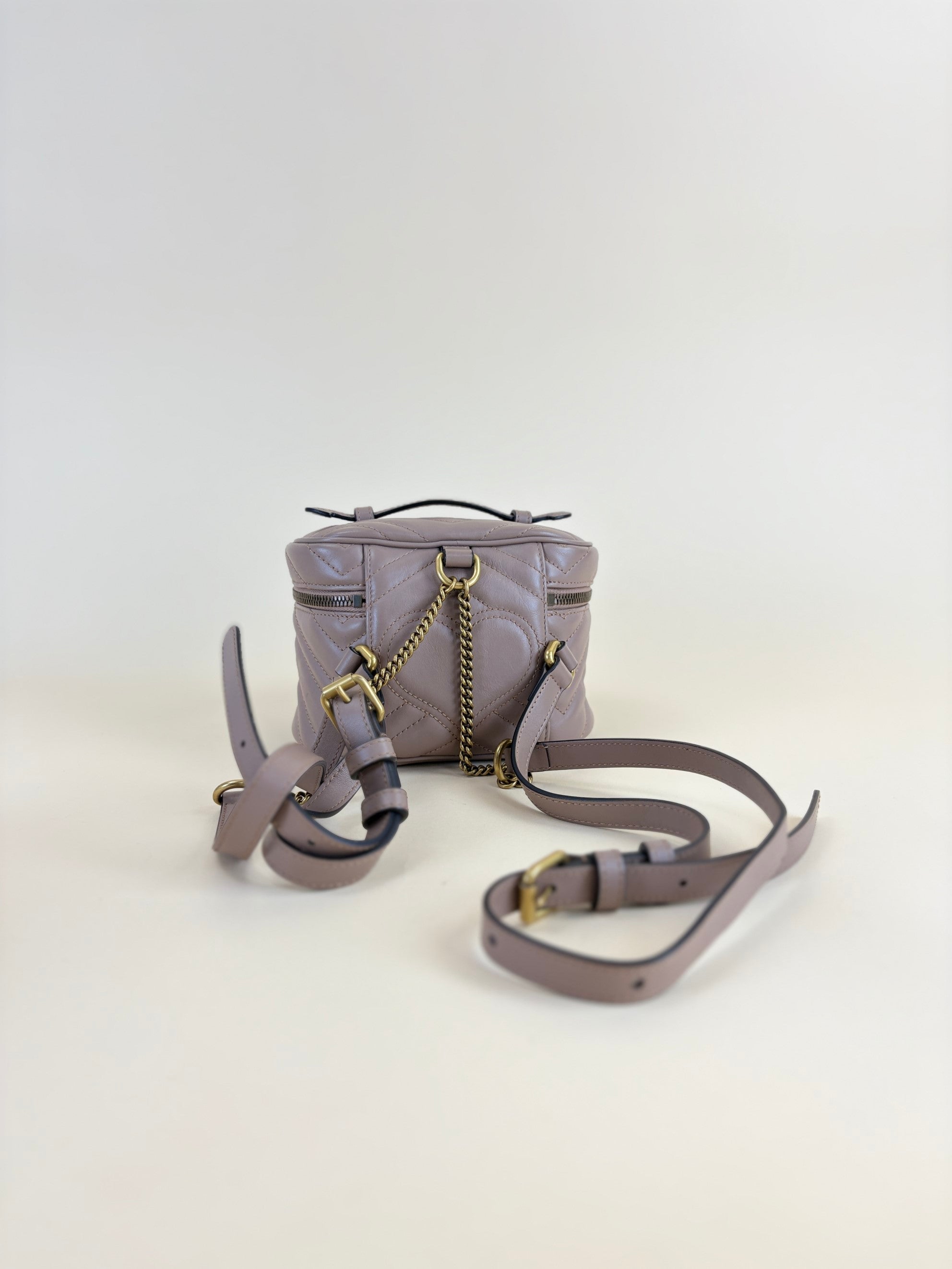 GUCCI nude calfskin matelassé mini gg Marmont round backpack bag