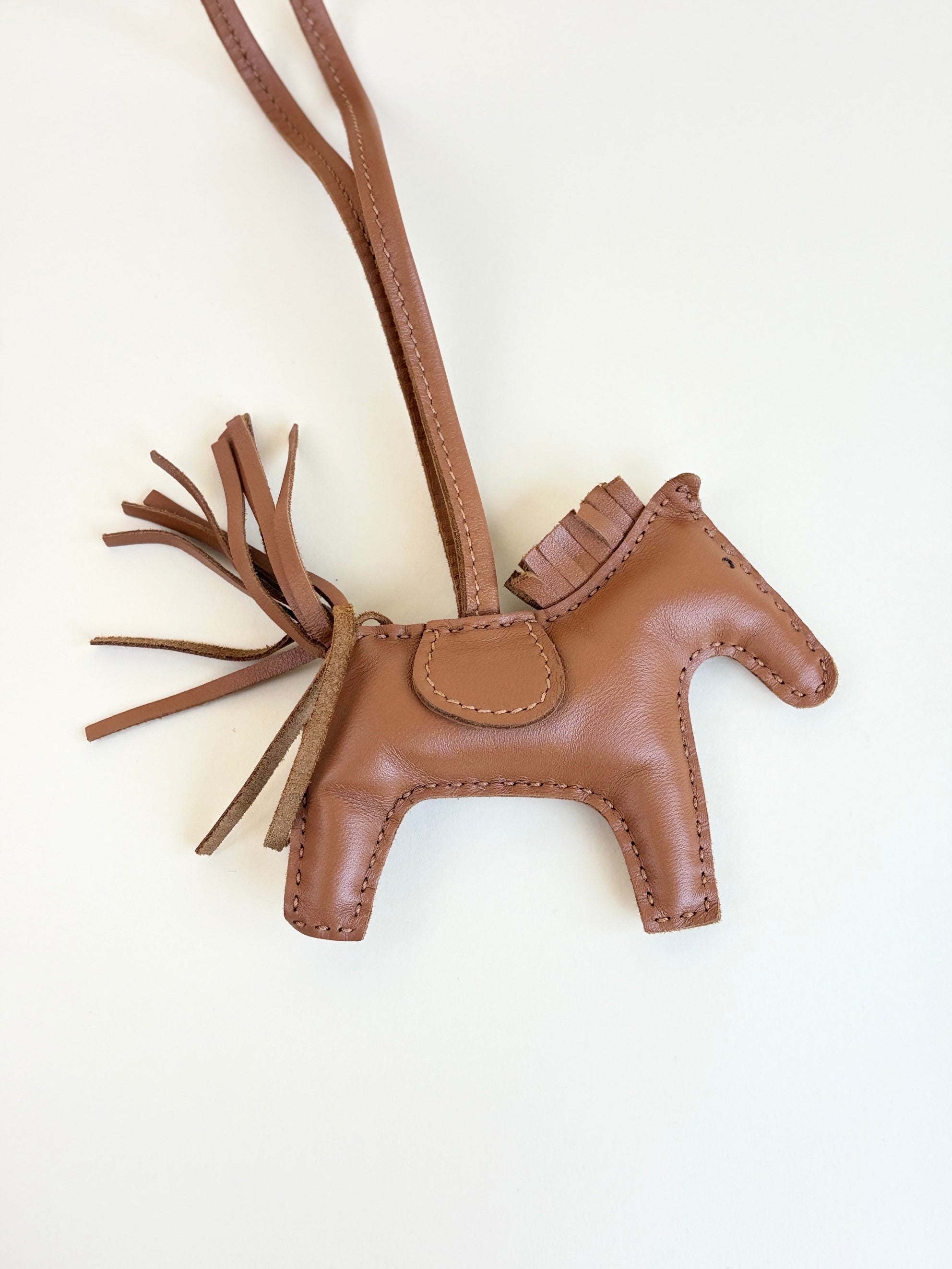 Hermes lambskin gold rodeo pm horse bag charm