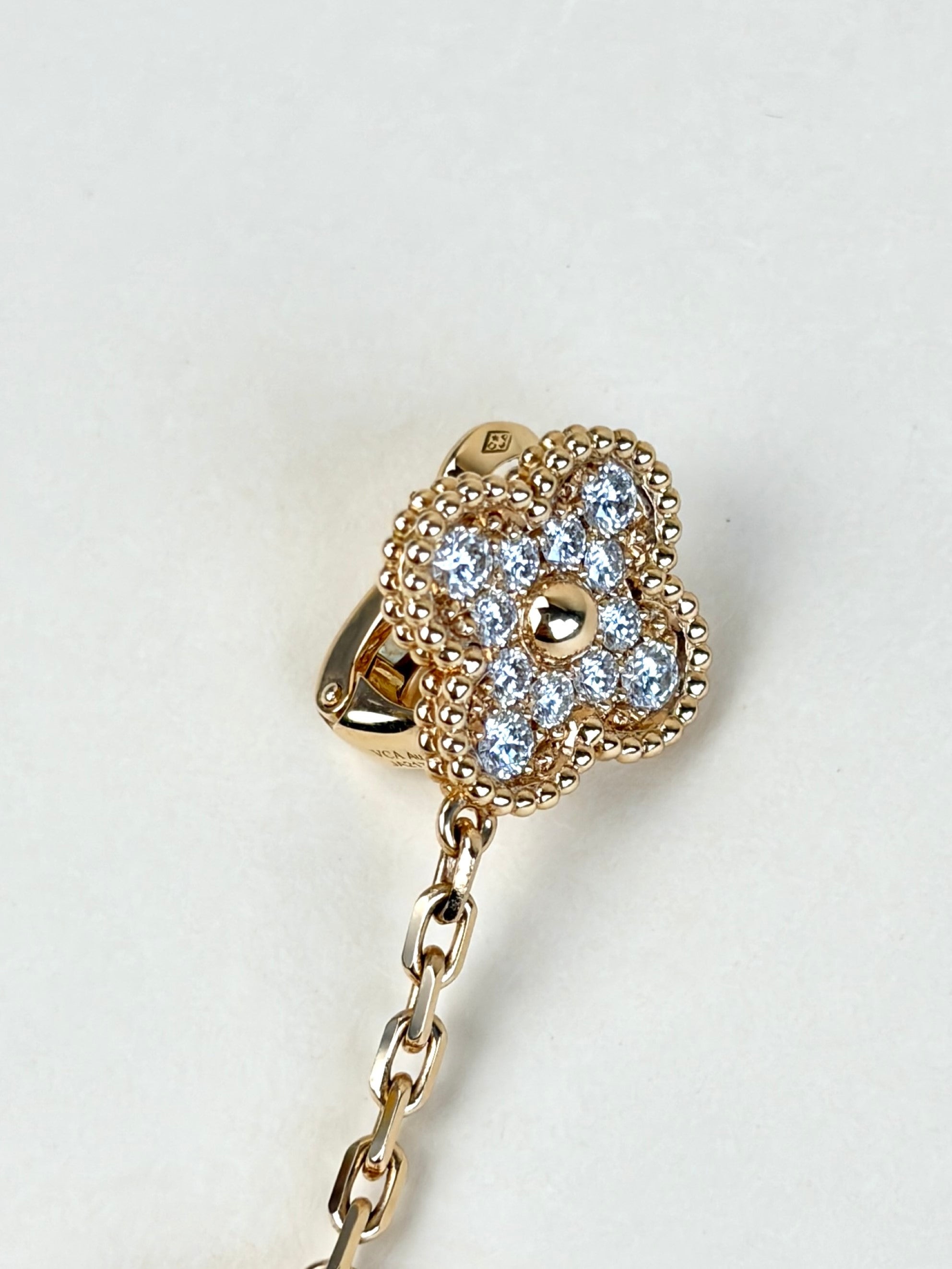 Van Cleef magic alhambra 2motifs 18 k rose gold and grey mother of pearl