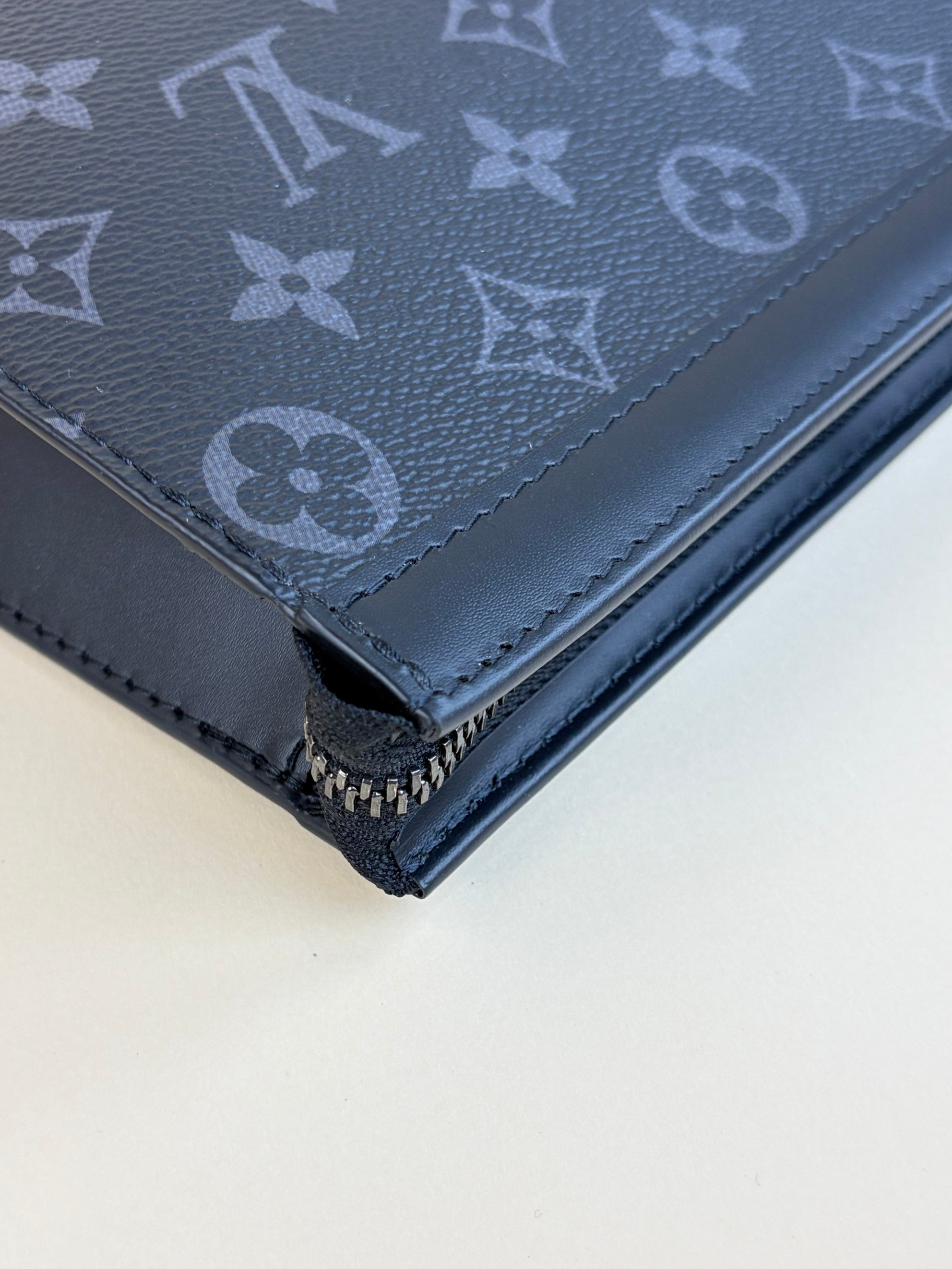 louis Vuitton monogram eclipse voyage mm pochette