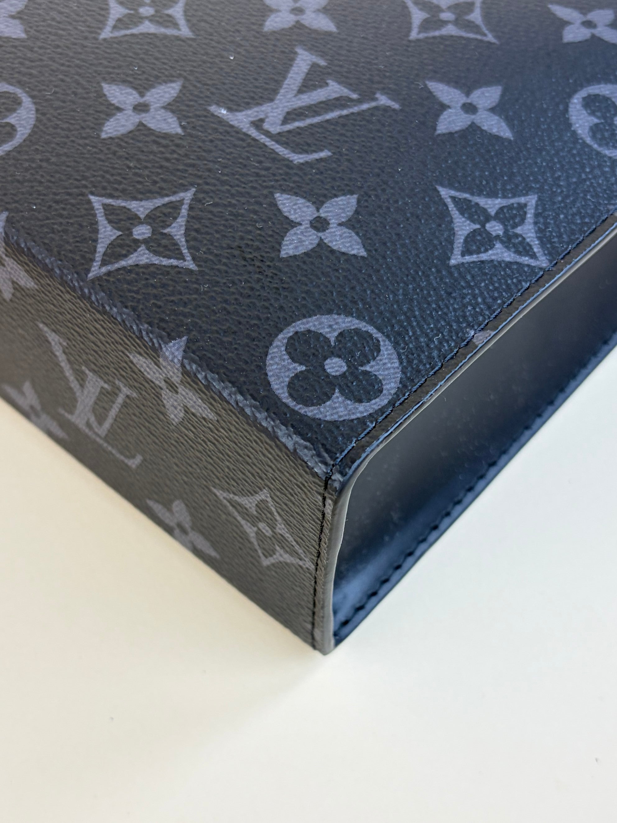 louis Vuitton monogram eclipse voyage mm pochette