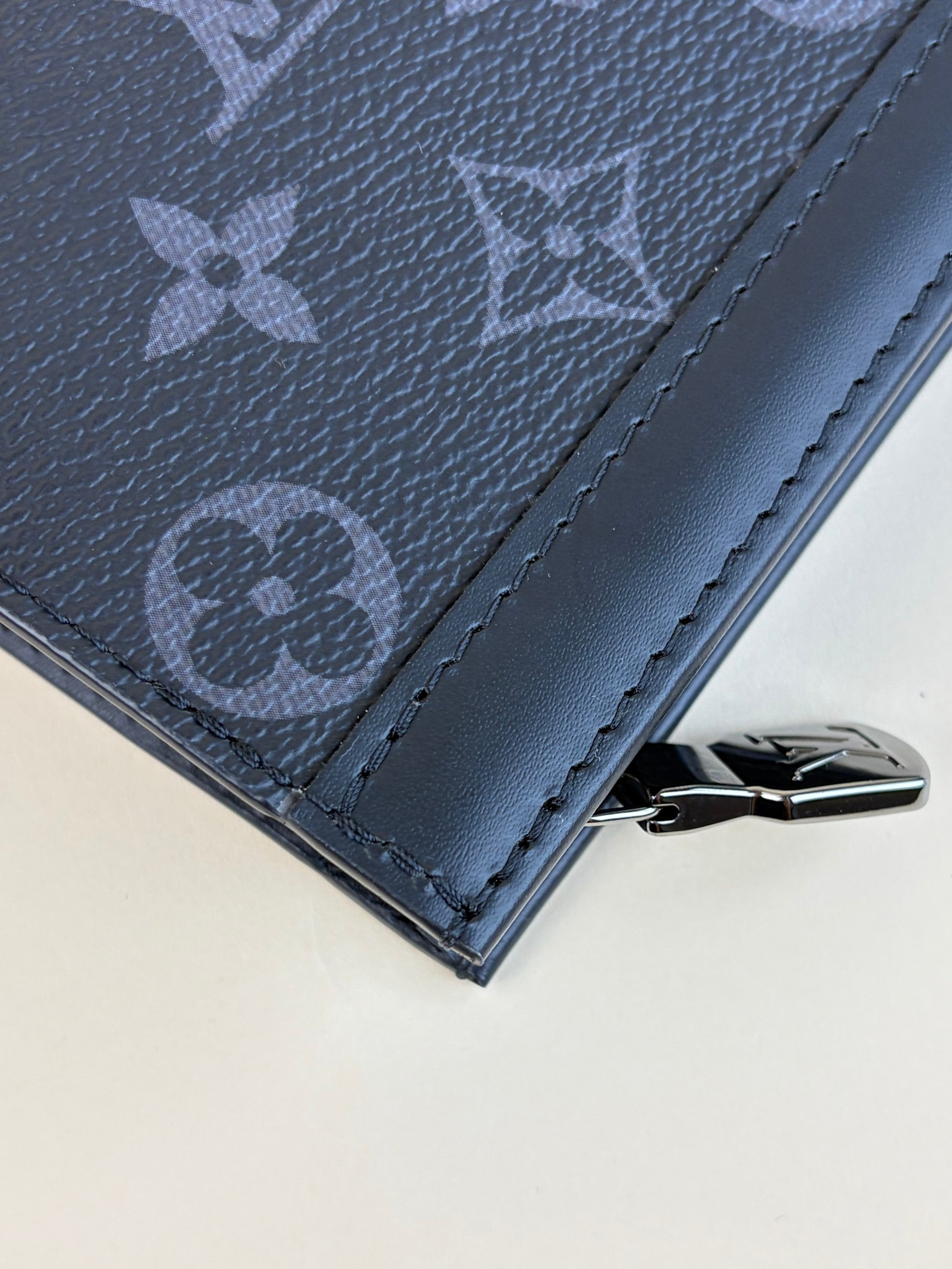 louis Vuitton monogram eclipse voyage mm pochette