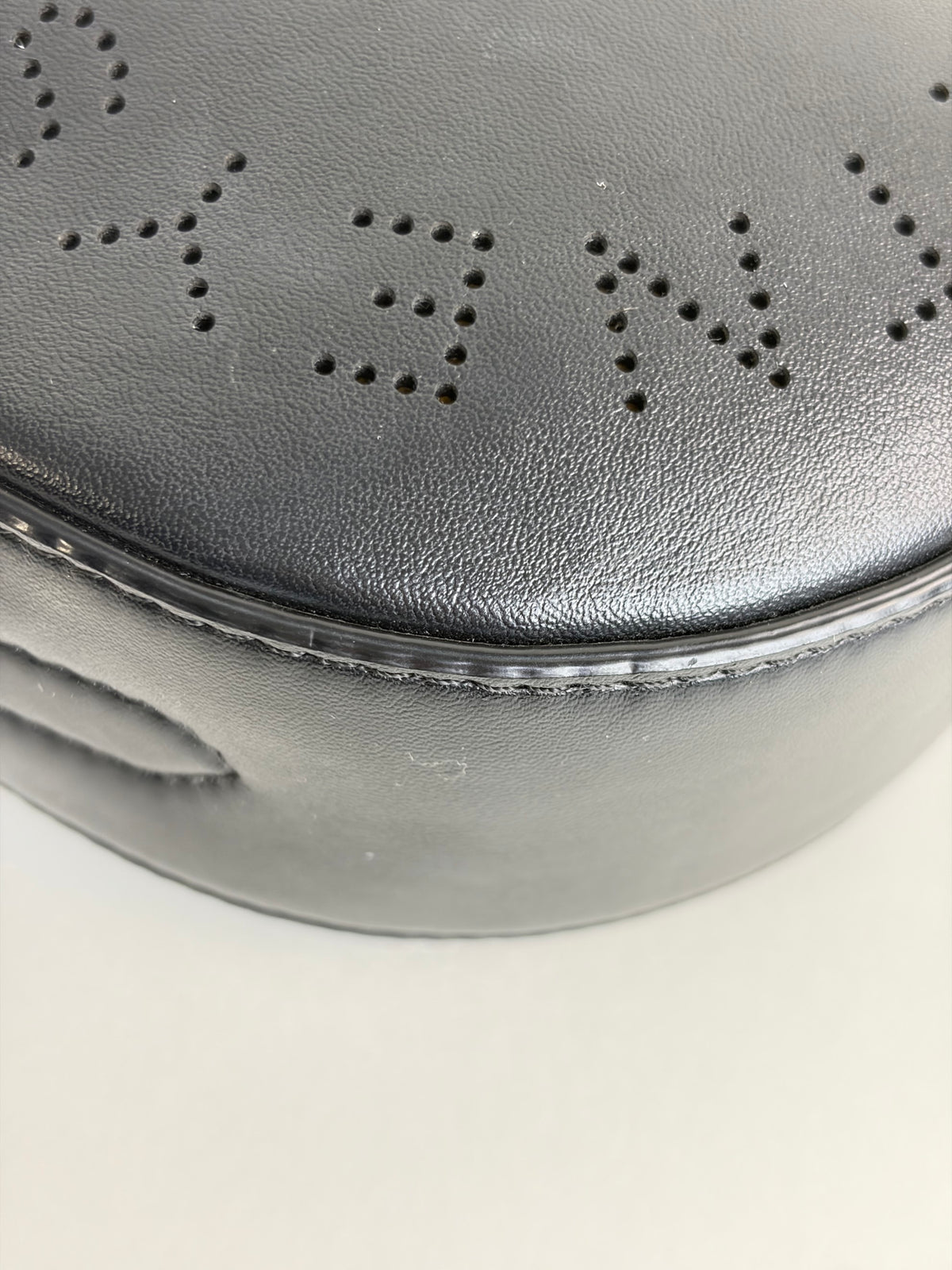 Stella Mccartney black mini round LOGO cross body bag
