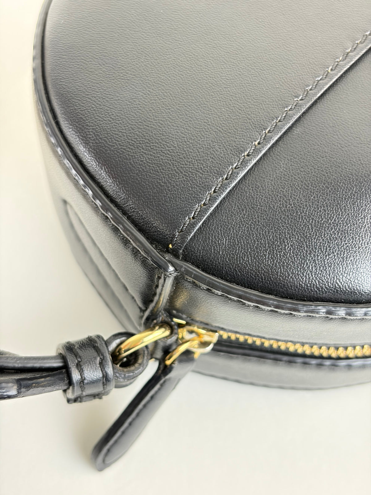 Stella Mccartney black mini round LOGO cross body bag