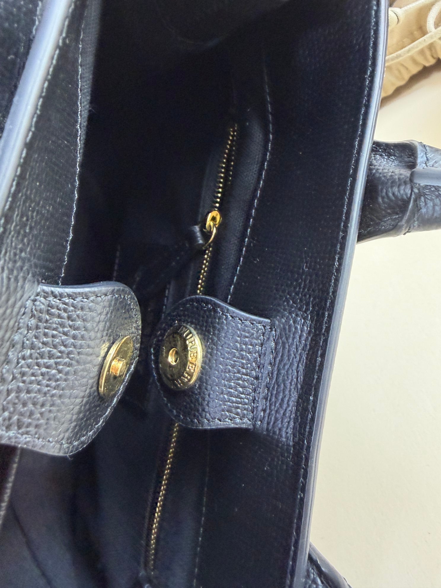 Burberry black leather house checks pebbled banner small