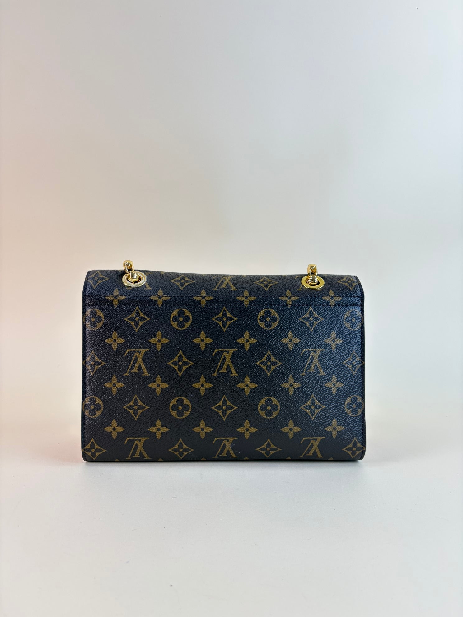 Louis Vuitton Monogram red flap Victoire Bag
