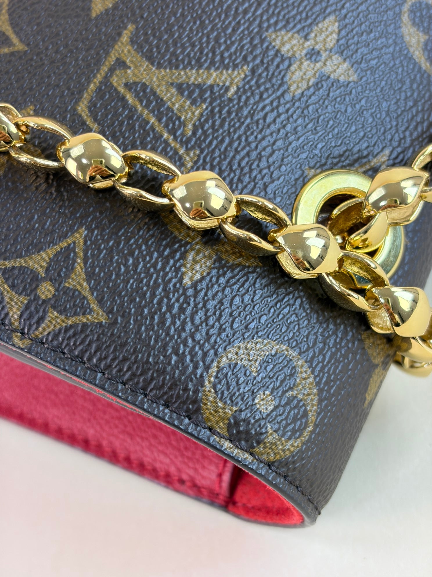 Louis Vuitton Monogram red flap Victoire Bag