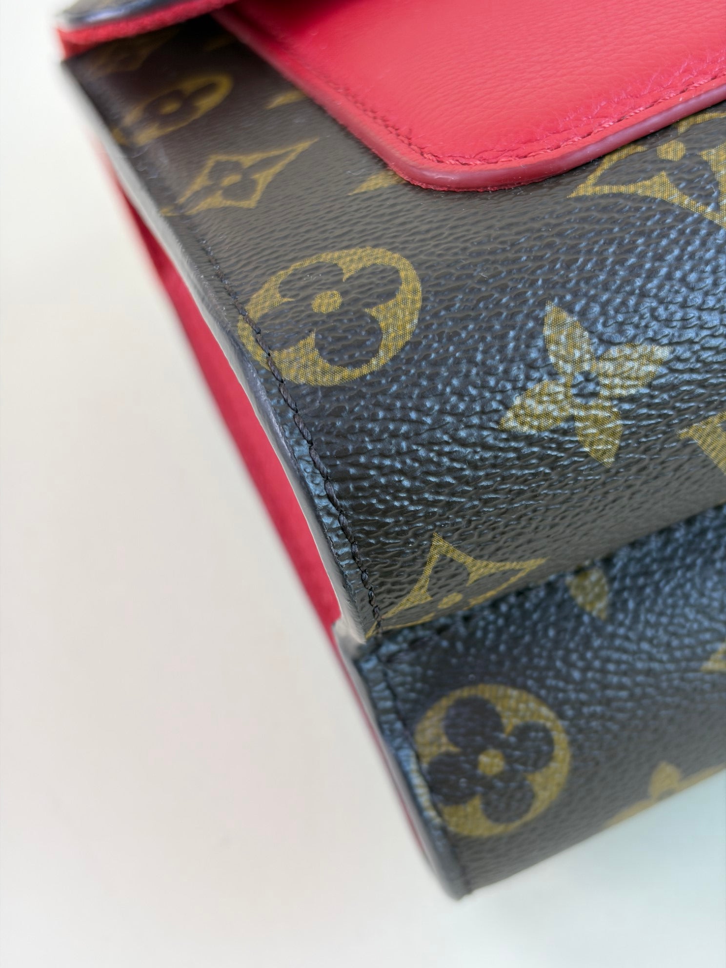 Louis Vuitton Monogram red flap Victoire Bag
