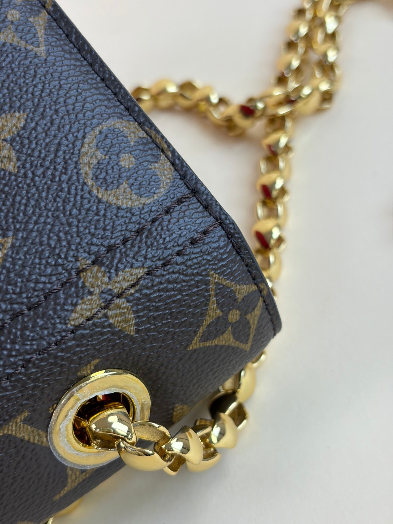 Louis Vuitton Monogram red flap Victoire Bag