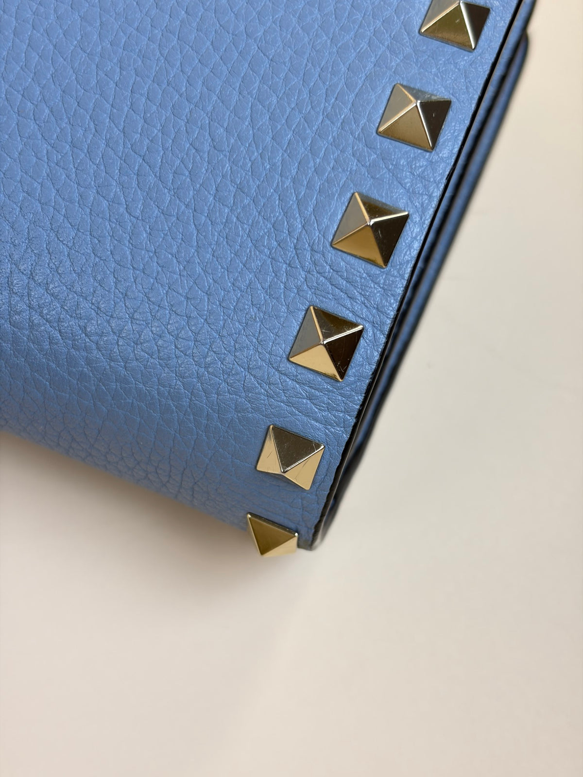 Valentino pebbled calfskin rock stud wallet on chain light blue