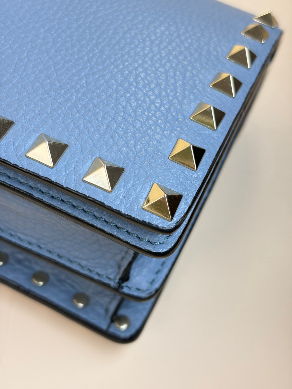Valentino pebbled calfskin rock stud wallet on chain light blue