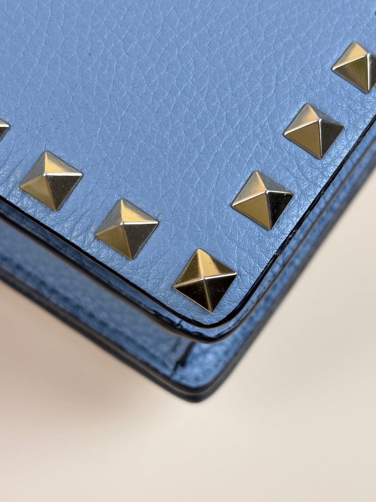 Valentino pebbled calfskin rock stud wallet on chain light blue
