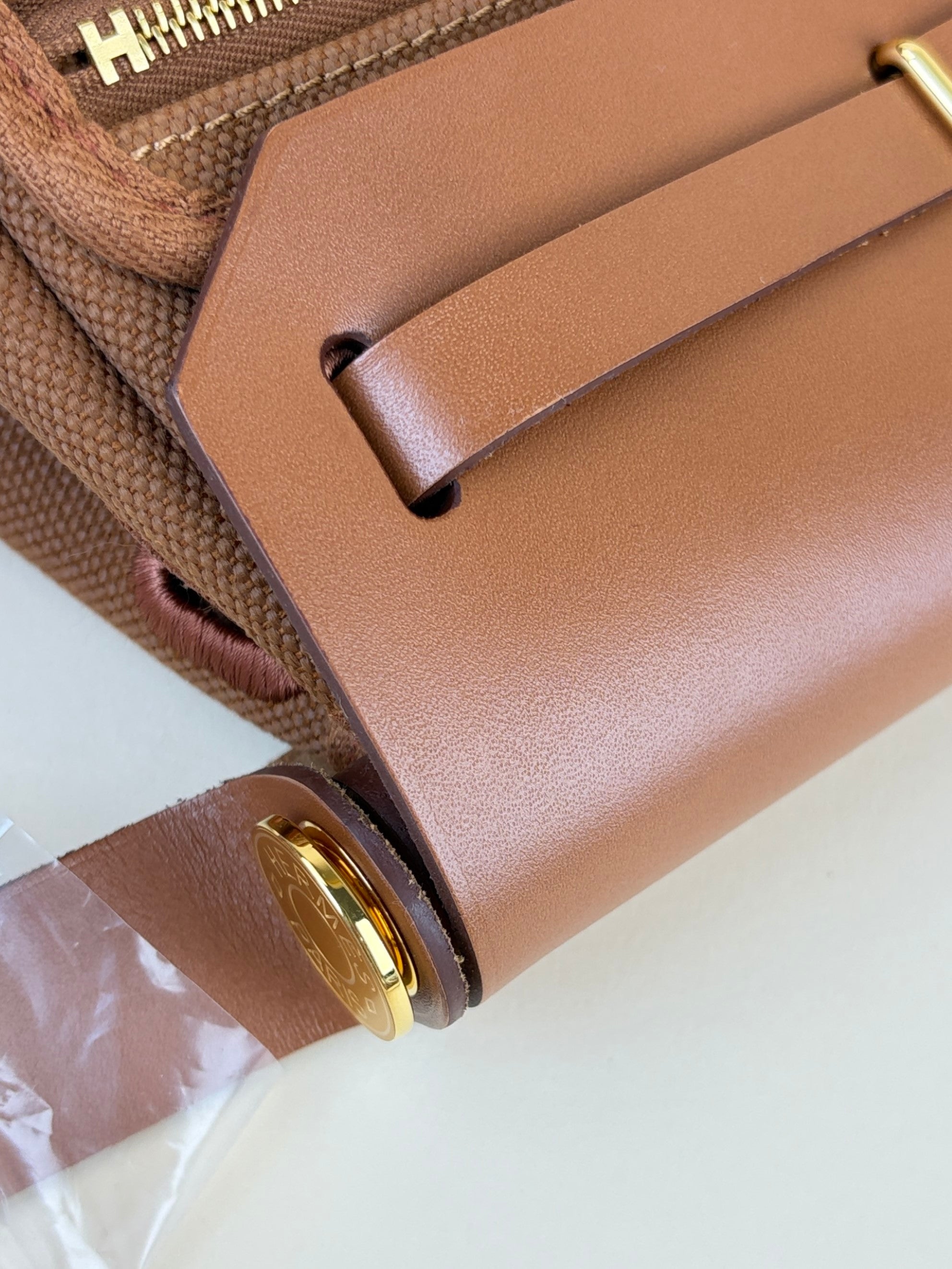 Hermes gold/fauve canvas and Vache hunter leather herbage zip20 mini bag