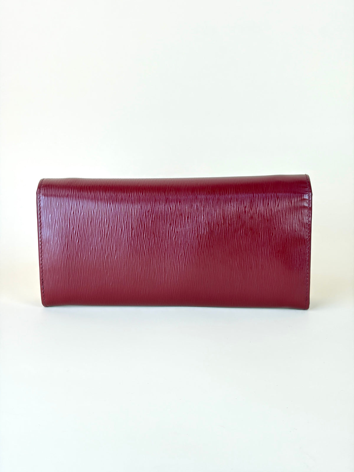 Prada rubino vitello move leather wallet on chain clutch