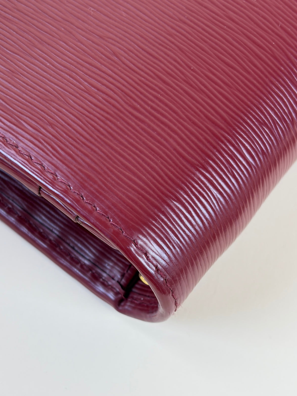Prada rubino vitello move leather wallet on chain clutch
