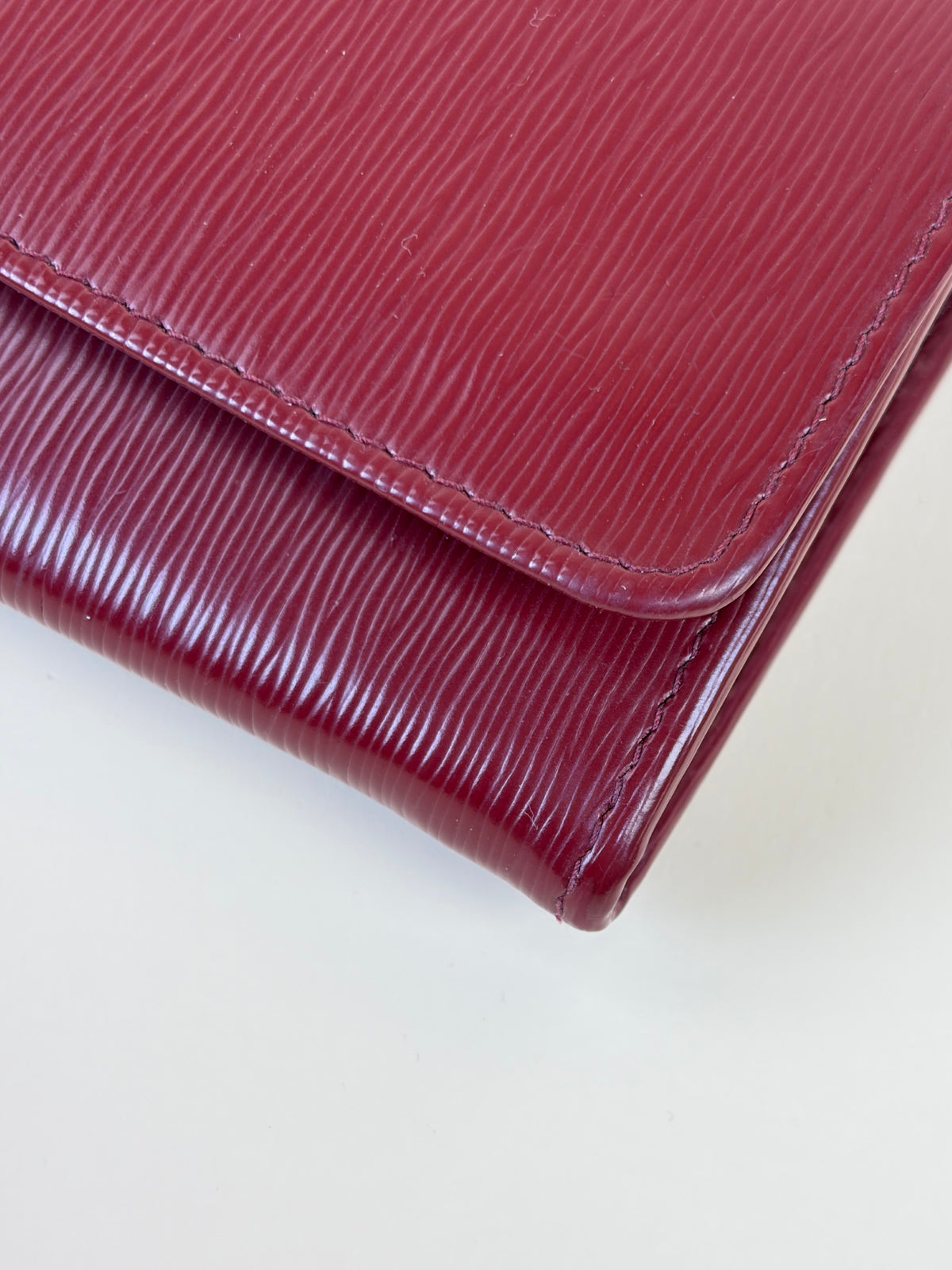 Prada rubino vitello move leather wallet on chain clutch