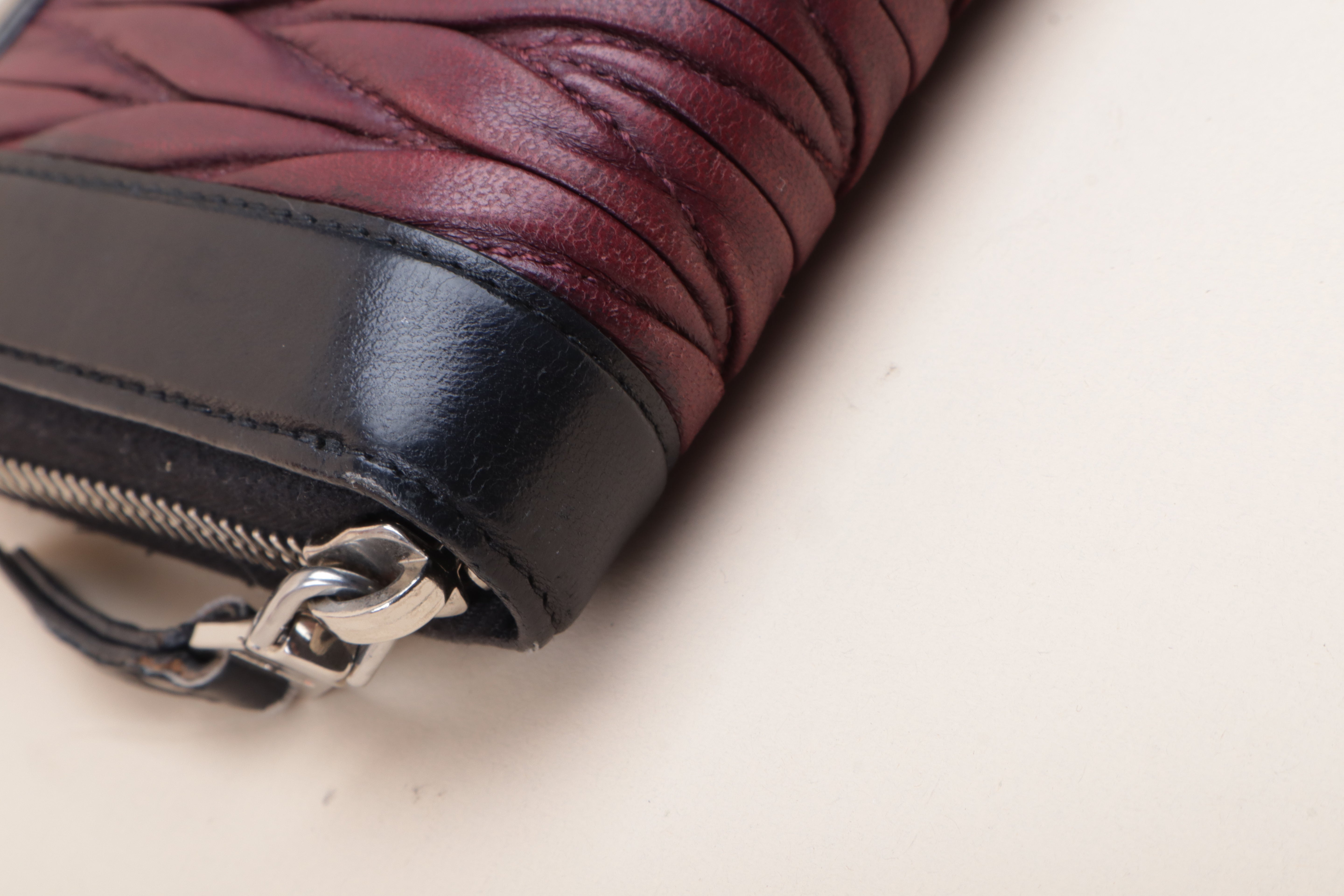 MIU MIU black and burgundy Matelassé Zip around