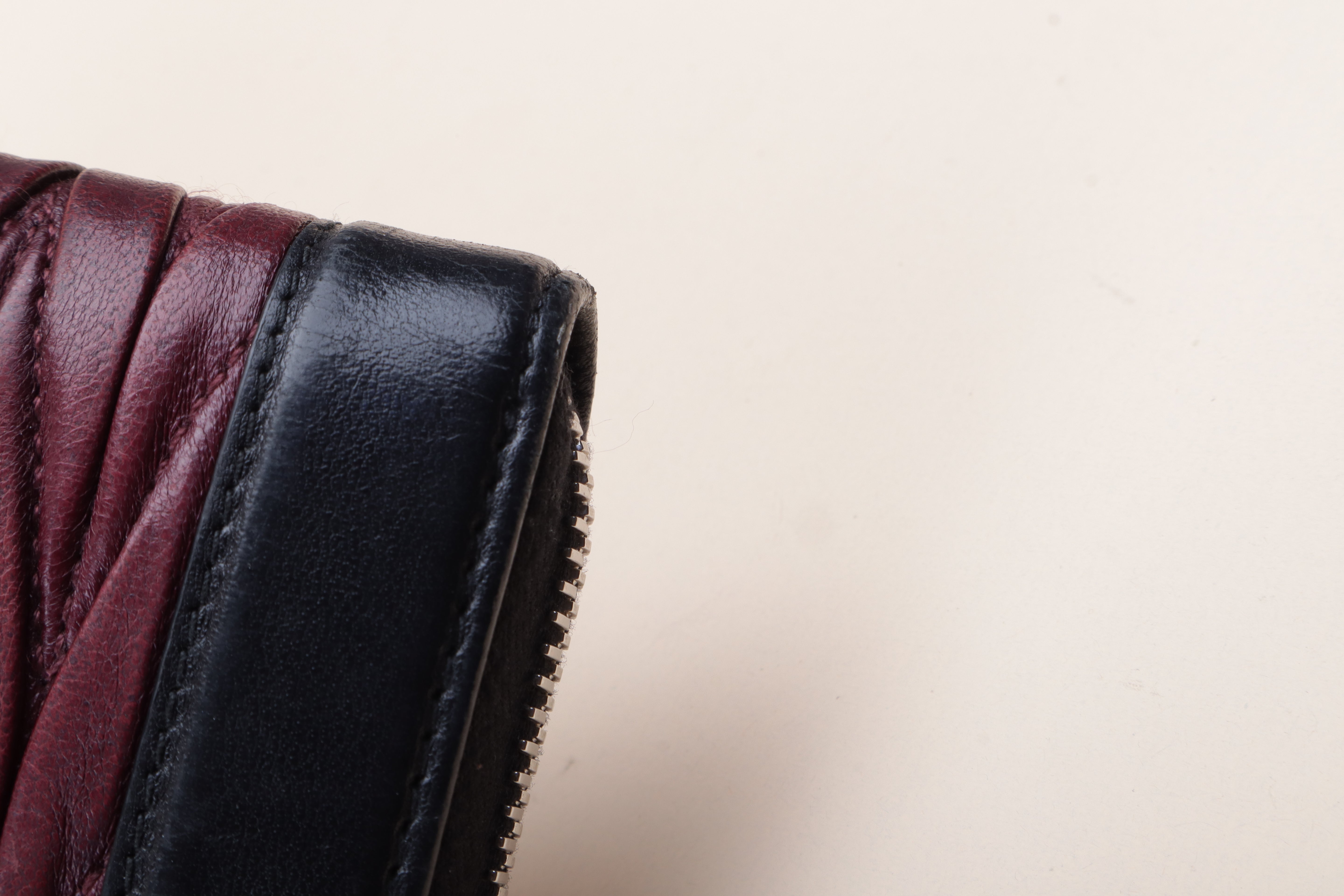 MIU MIU black and burgundy Matelassé Zip around