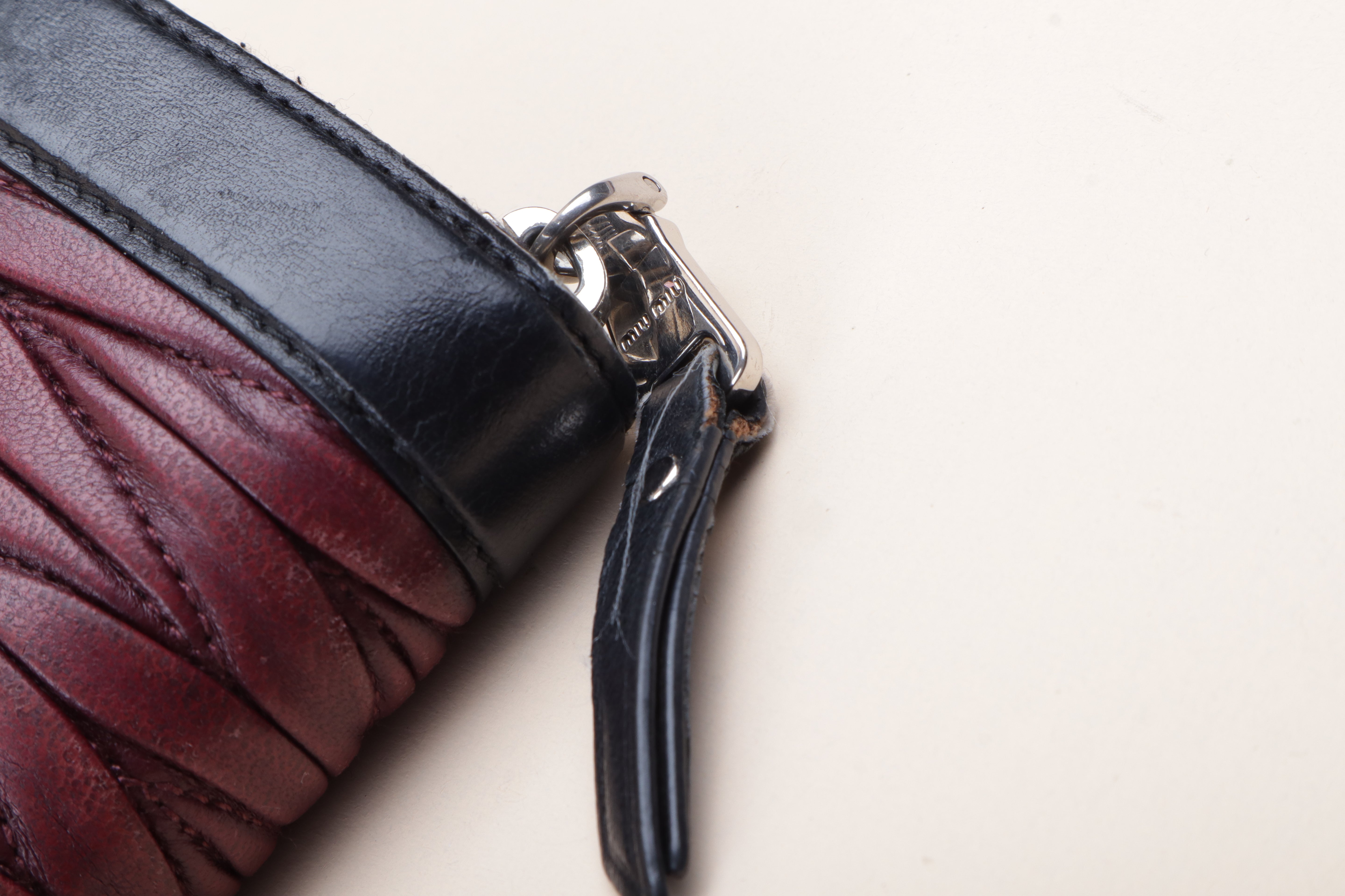MIU MIU black and burgundy Matelassé Zip around