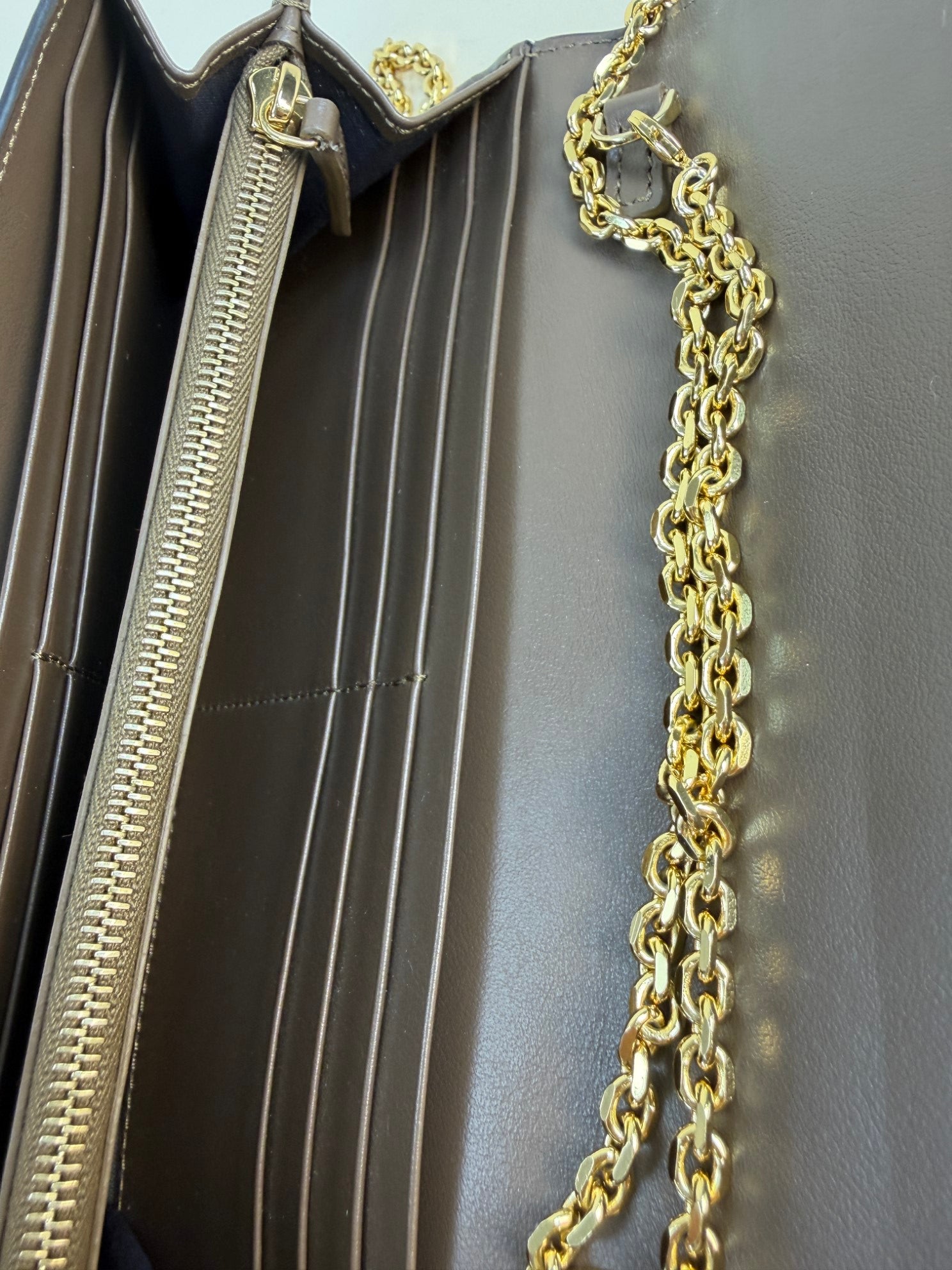 Fendi vitello soft f is Fendi bi color ff 1974embossed mega black continental envelope wallet on chain