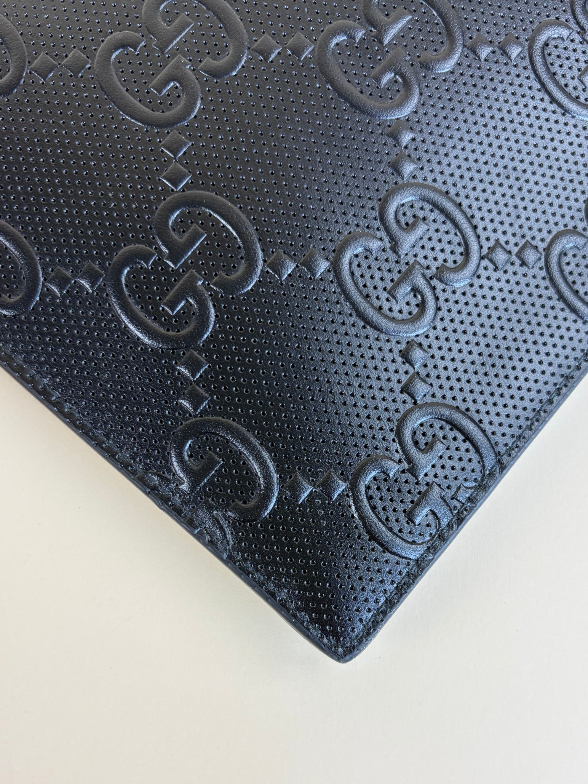 Gucci black calfskin gg tennis embossed wristlet pouch