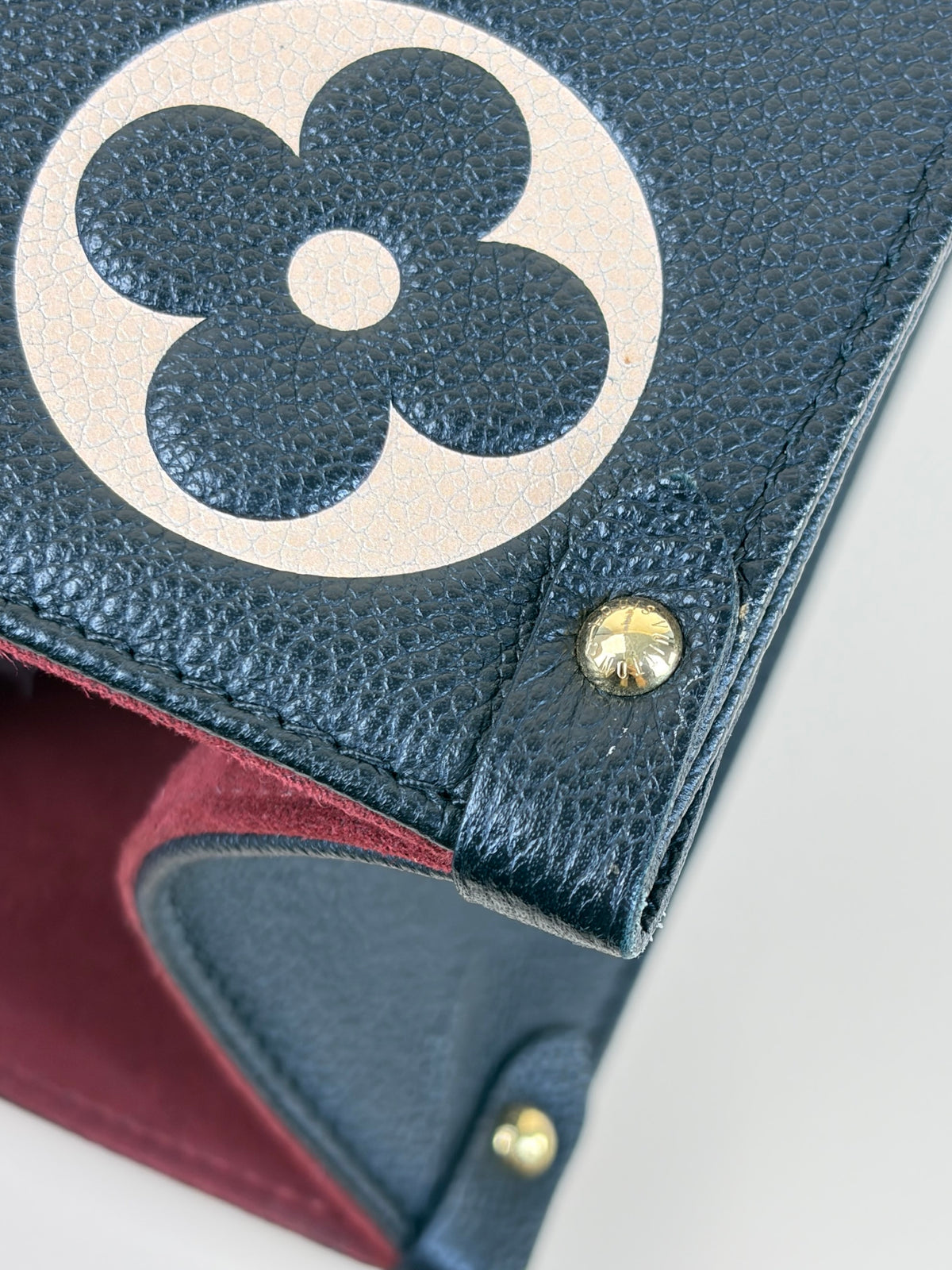 Louis Vuitton bicolor Monogram giant empriente on the go mm bag