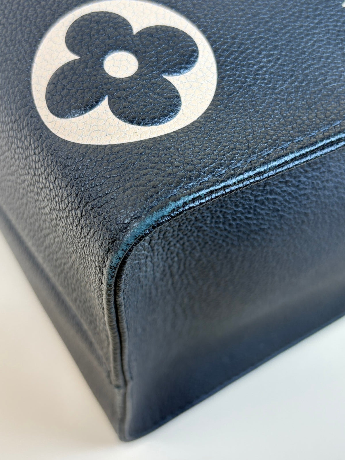 Louis Vuitton bicolor Monogram giant empriente on the go mm bag