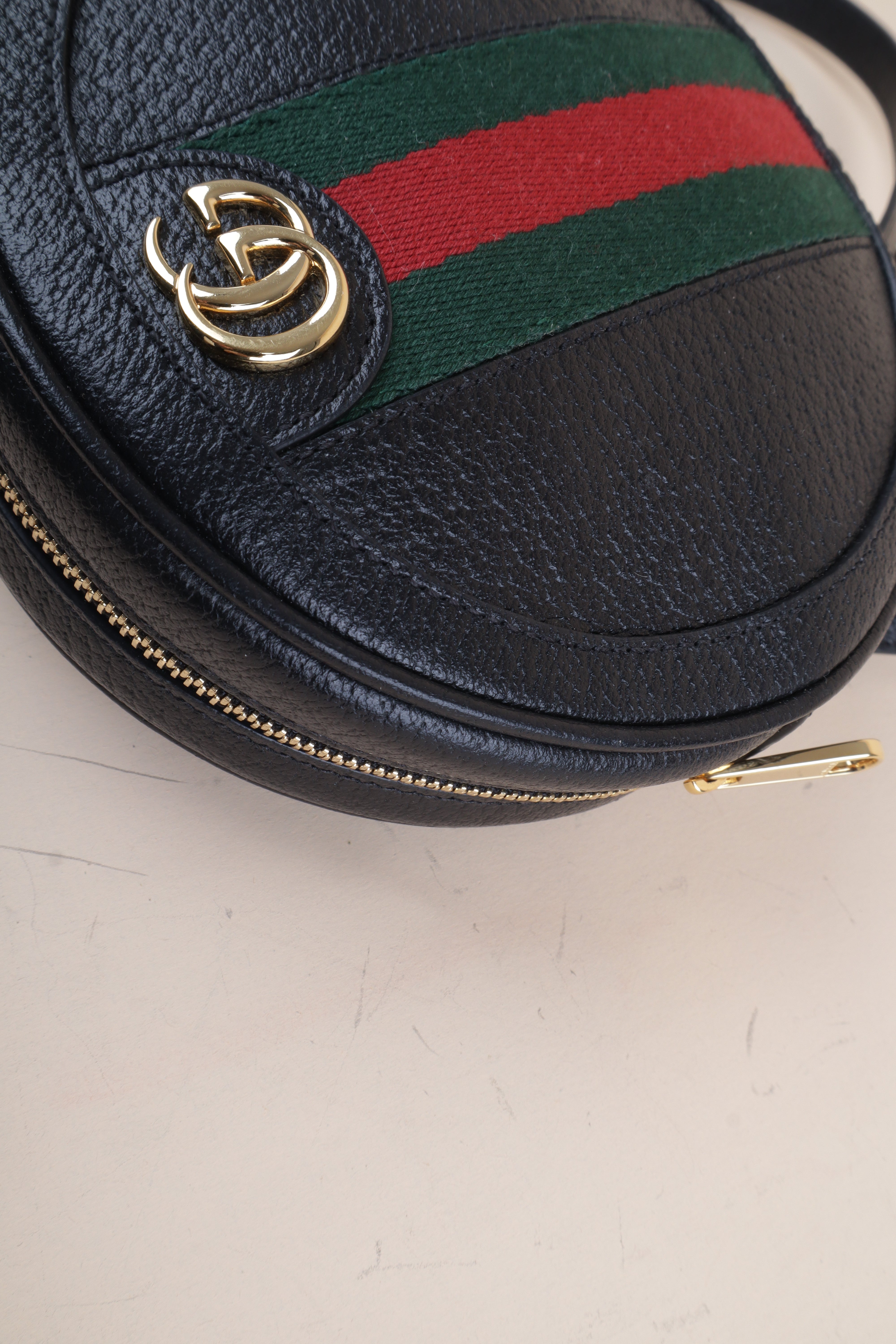 Gucci black mini round