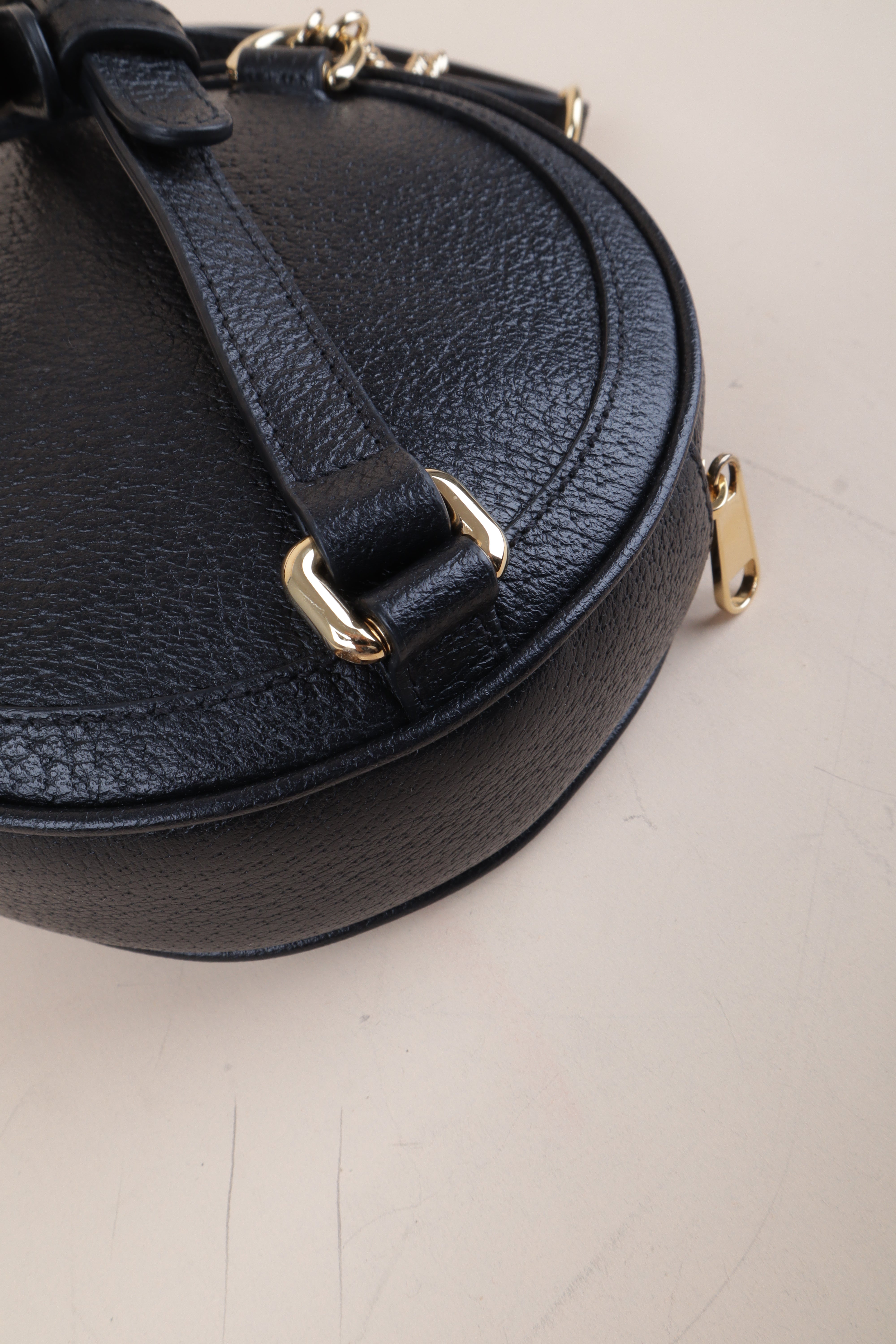Gucci black mini round