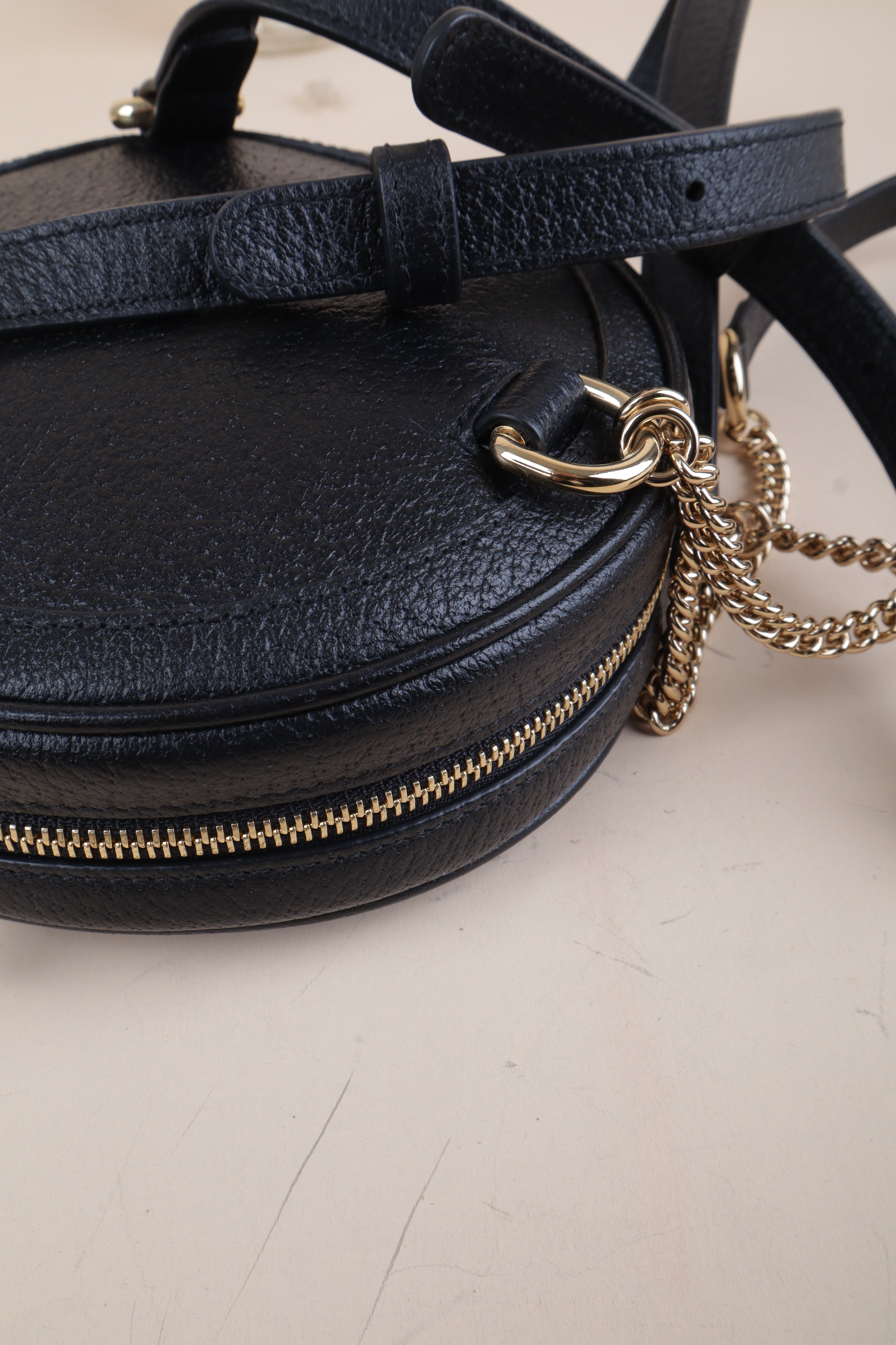 Gucci black mini round