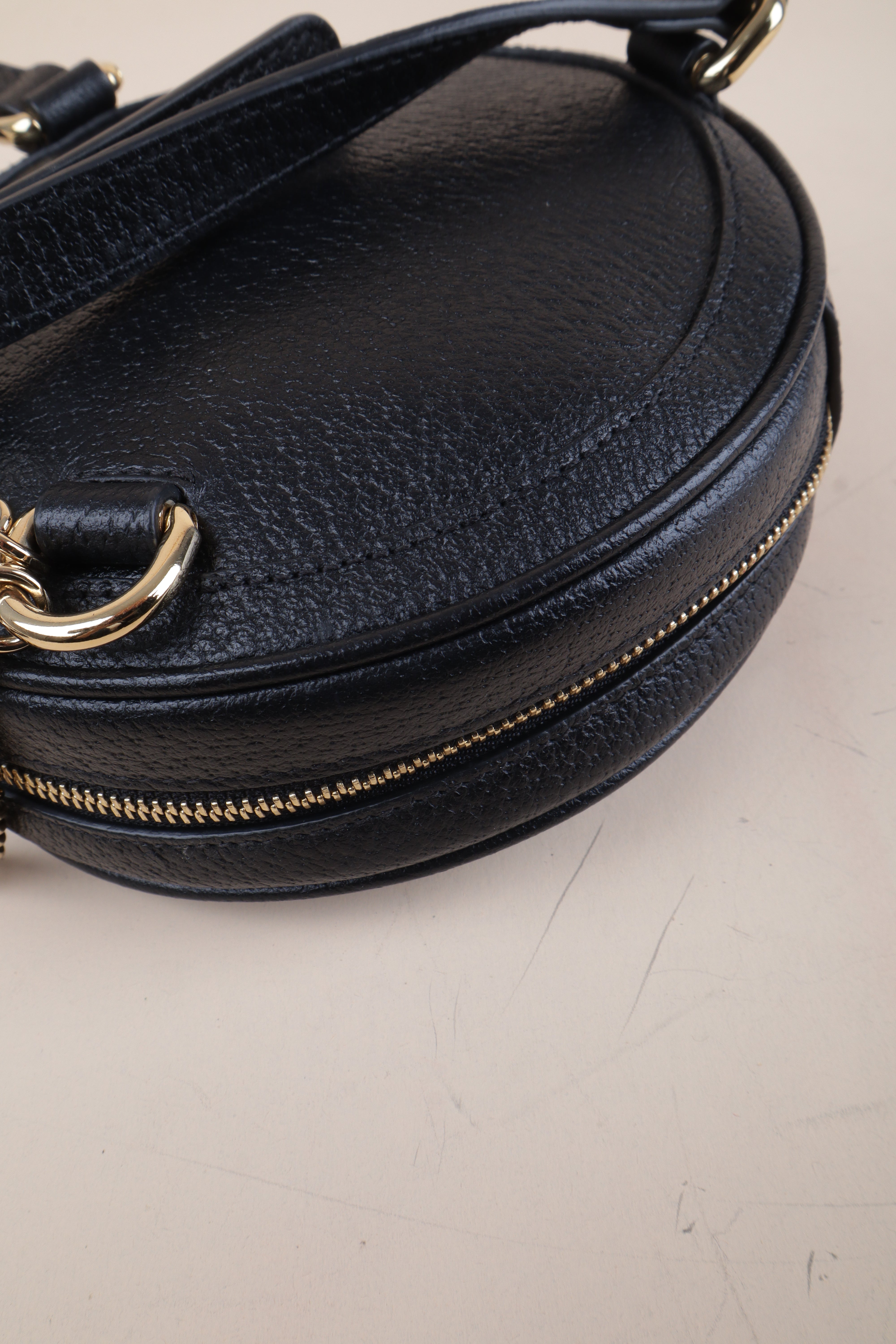 Gucci black mini round