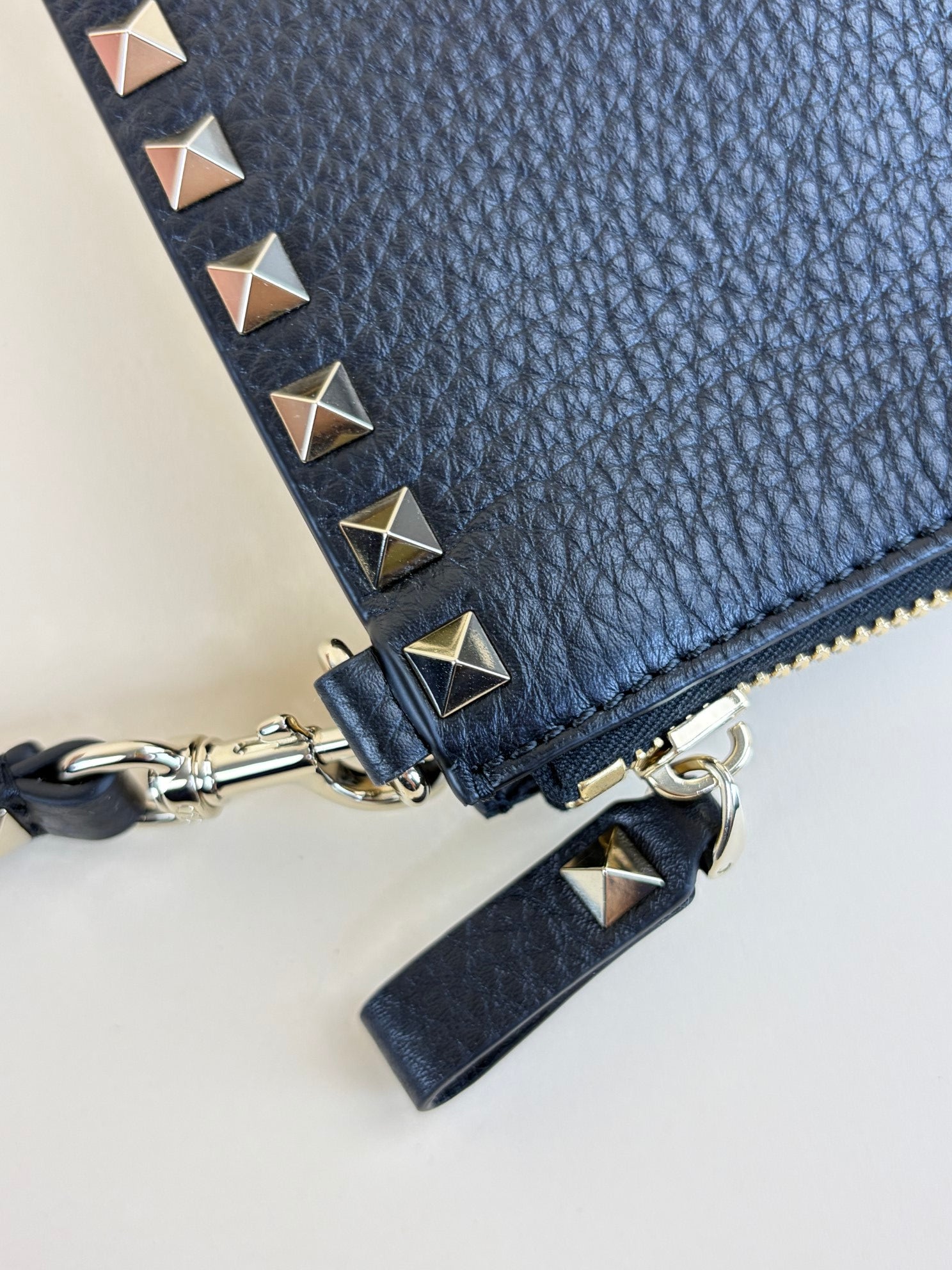 Valentino Black pebbled calfskin rockstud medium zip pouch