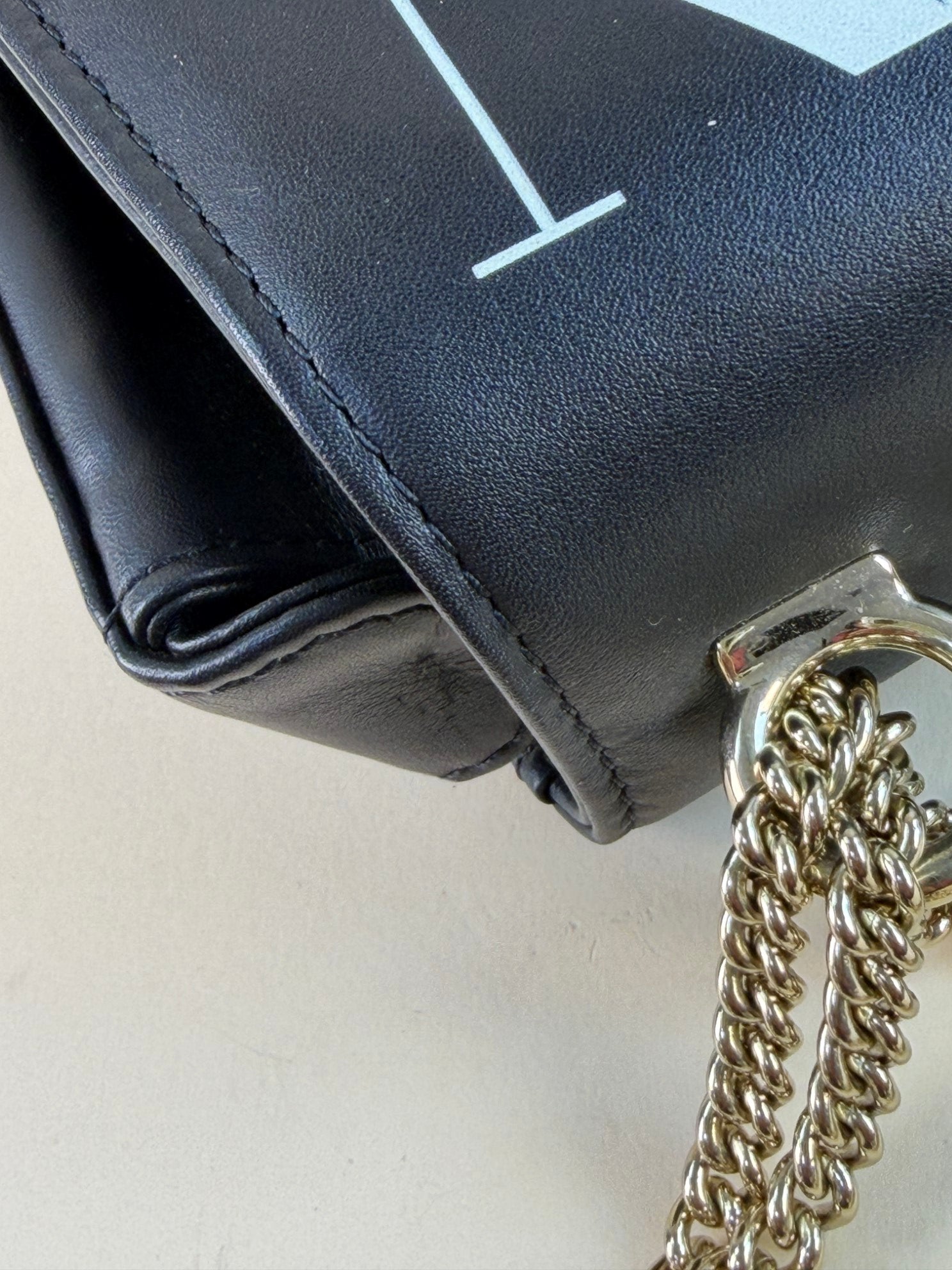 Valentino printed vl tv black studded saddle Shoulder Bag