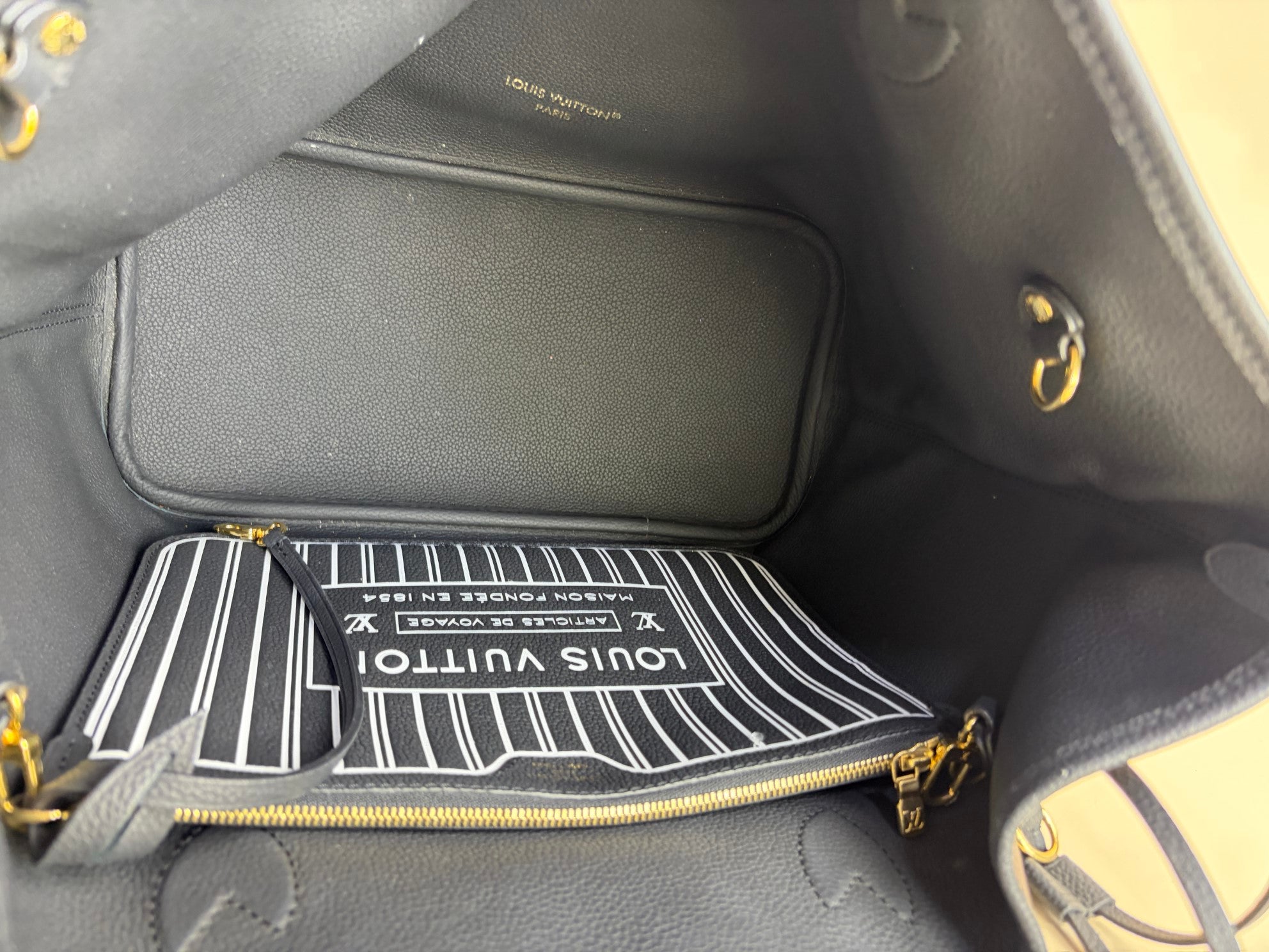 louis Vuitton never full inside out mm pouch monogram and black