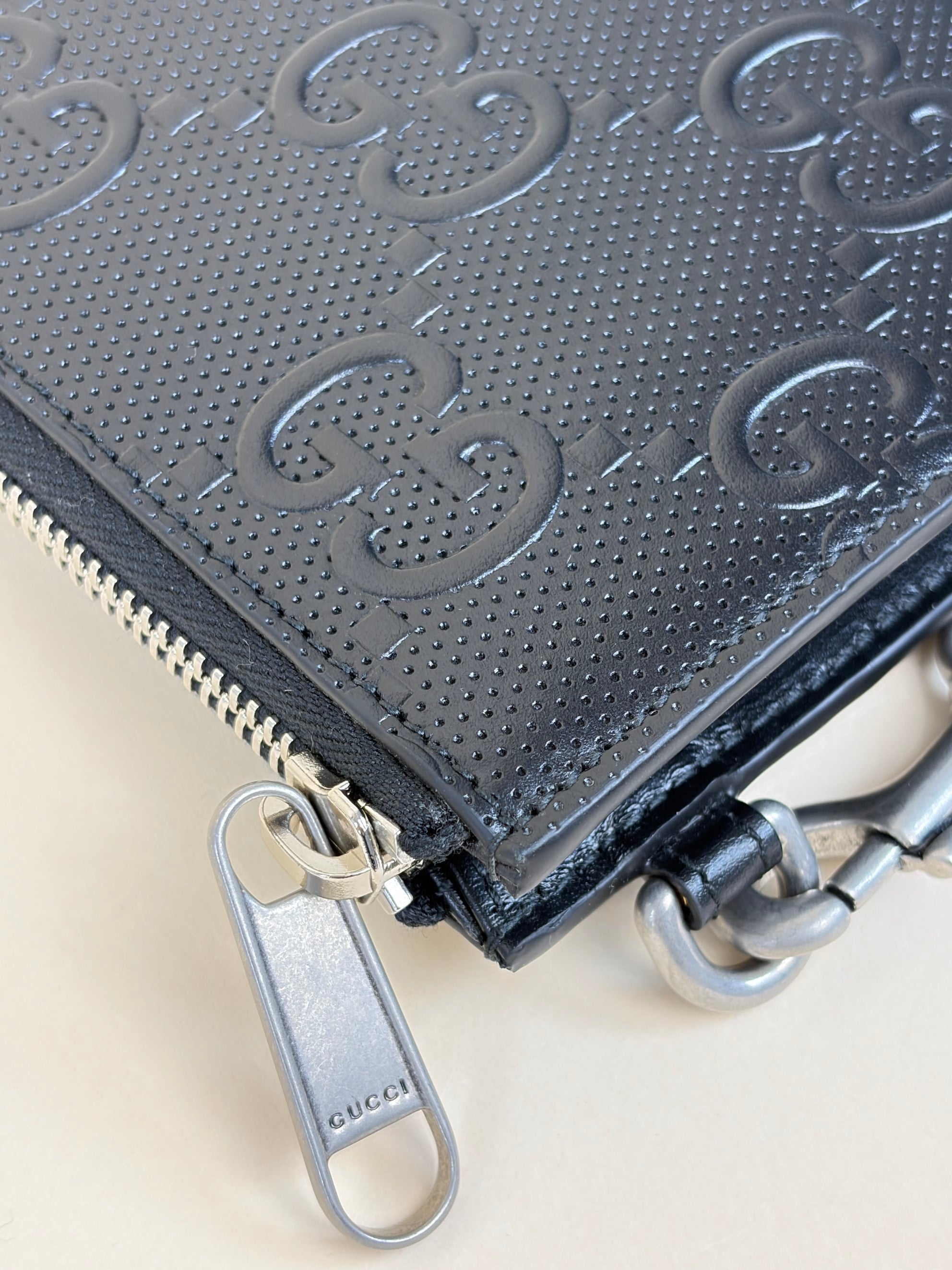 Gucci black Clutch calf skin gg tennis embossed wristlet pouch