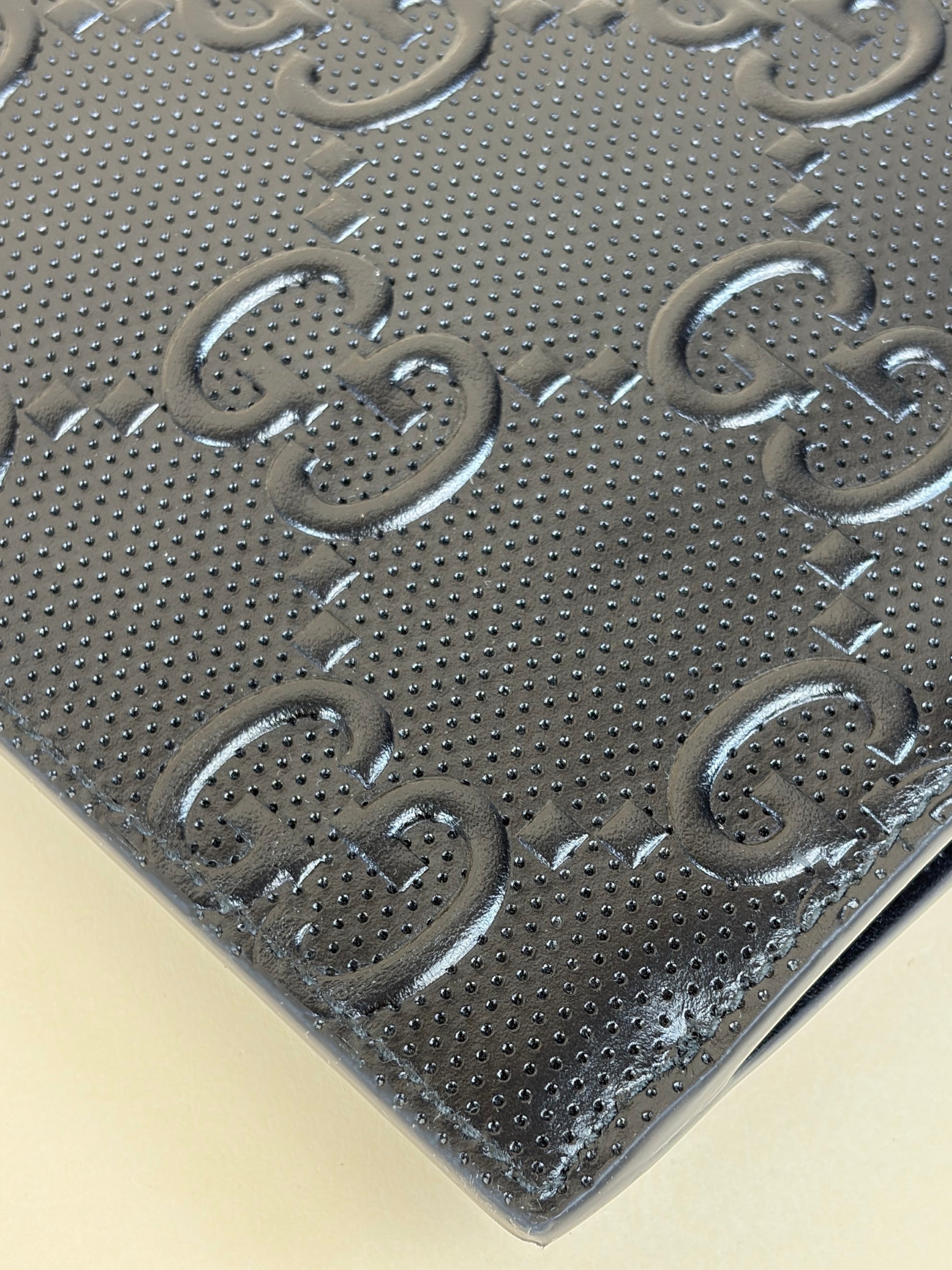 Gucci black Clutch calf skin gg tennis embossed wristlet pouch
